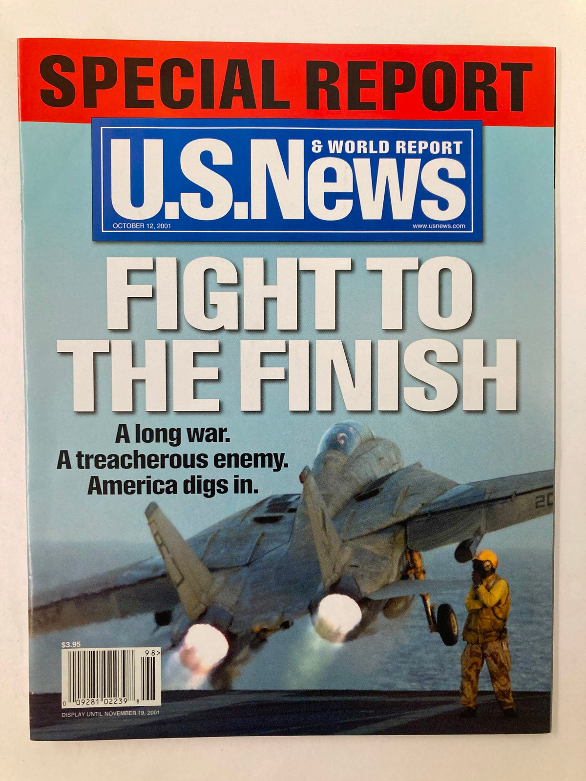 Cover of US News & World Report from October 12, 2001, titled 'Fight To The Finish'. Features imagery of military personnel and aircraft, emphasizing themes of war and resilience.