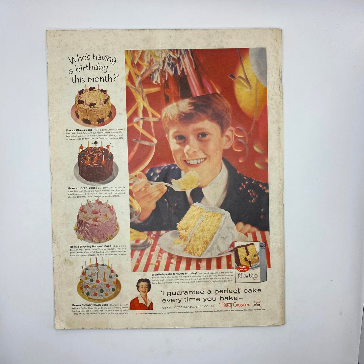 Back cover of the Saturday Evening Post Magazine, March 21, 1959, showcasing a birthday cake advertisement with a smiling boy enjoying cake and colorful decorations.