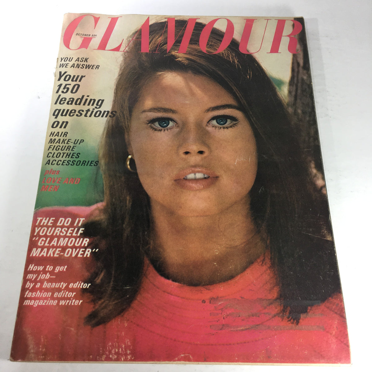 Cover of VTG Glamour Magazine: October 1965 featuring a young woman with striking blue eyes and long hair, representing iconic 1960s fashion.