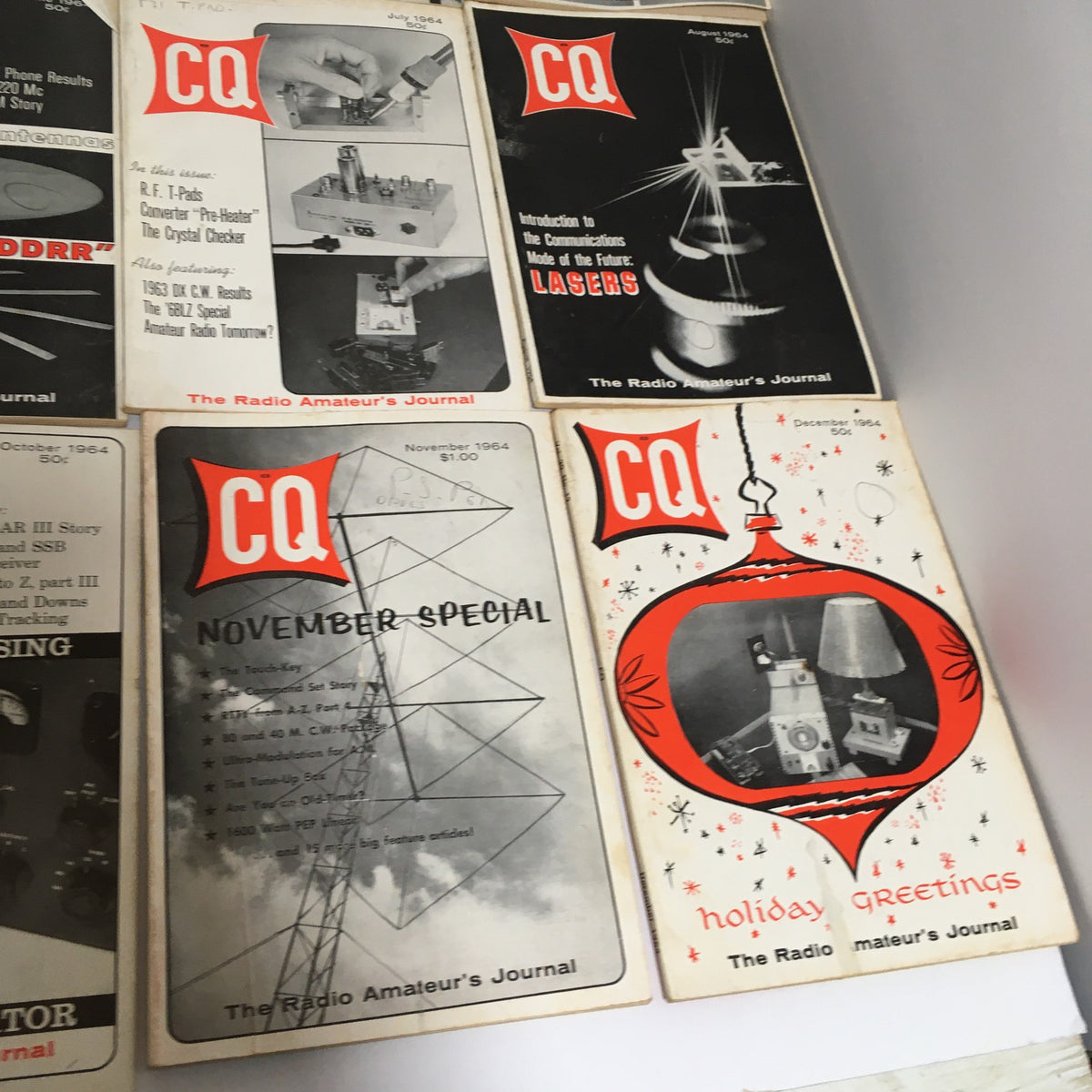 Covers of CQ The Radio Amateur's Journal from 1964, showcasing various issues including the November Special and Holiday Greetings, capturing historical amateur radio culture.