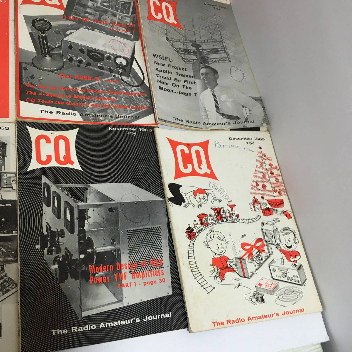 Final selection of the 12 issues of 1965 CQ The Radio Amateur's Journal, displaying November and December covers focused on power amplifiers and holiday themes.