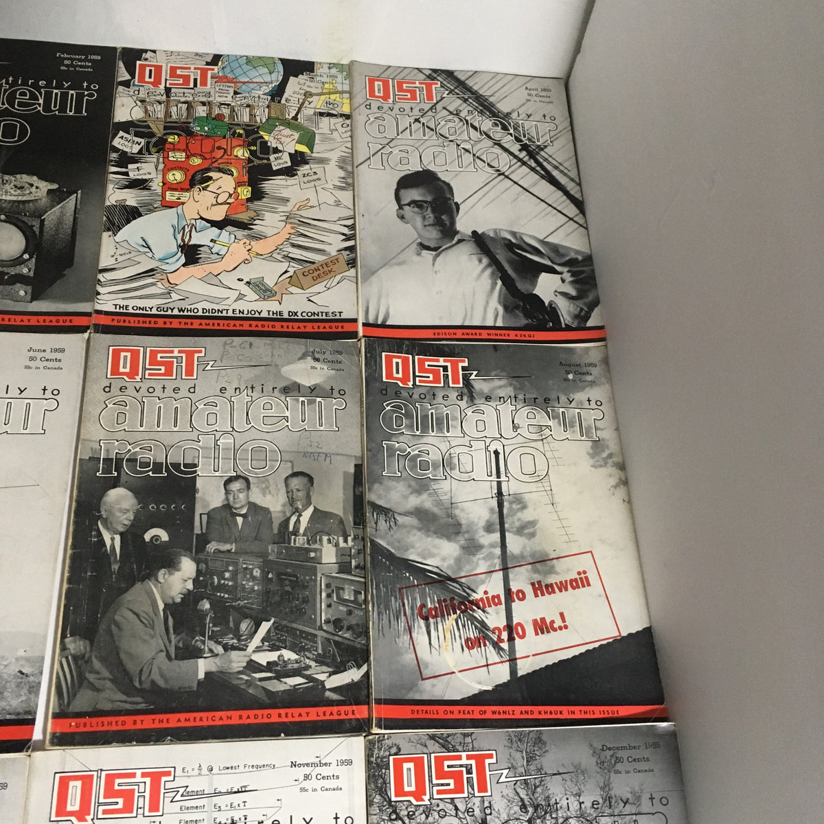 Lot of 12 Complete January to December 1959 QST Amateur Radio magazines displaying magazine covers with amateur radio experts and community events.