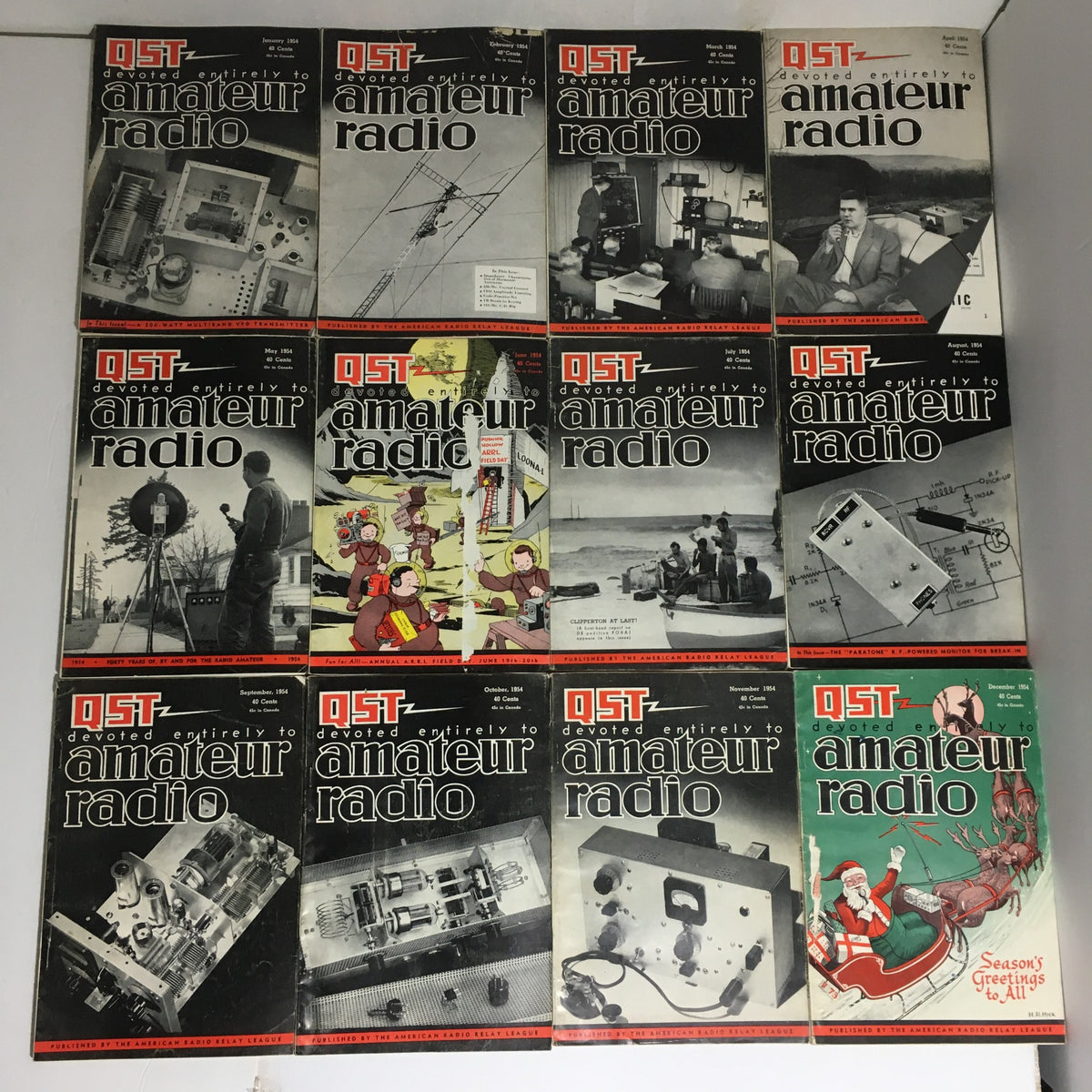 Lot of 12 complete January to December 1954 QST Amateur Radio magazines, showcasing covers from each month featuring amateur radio technology and community.
