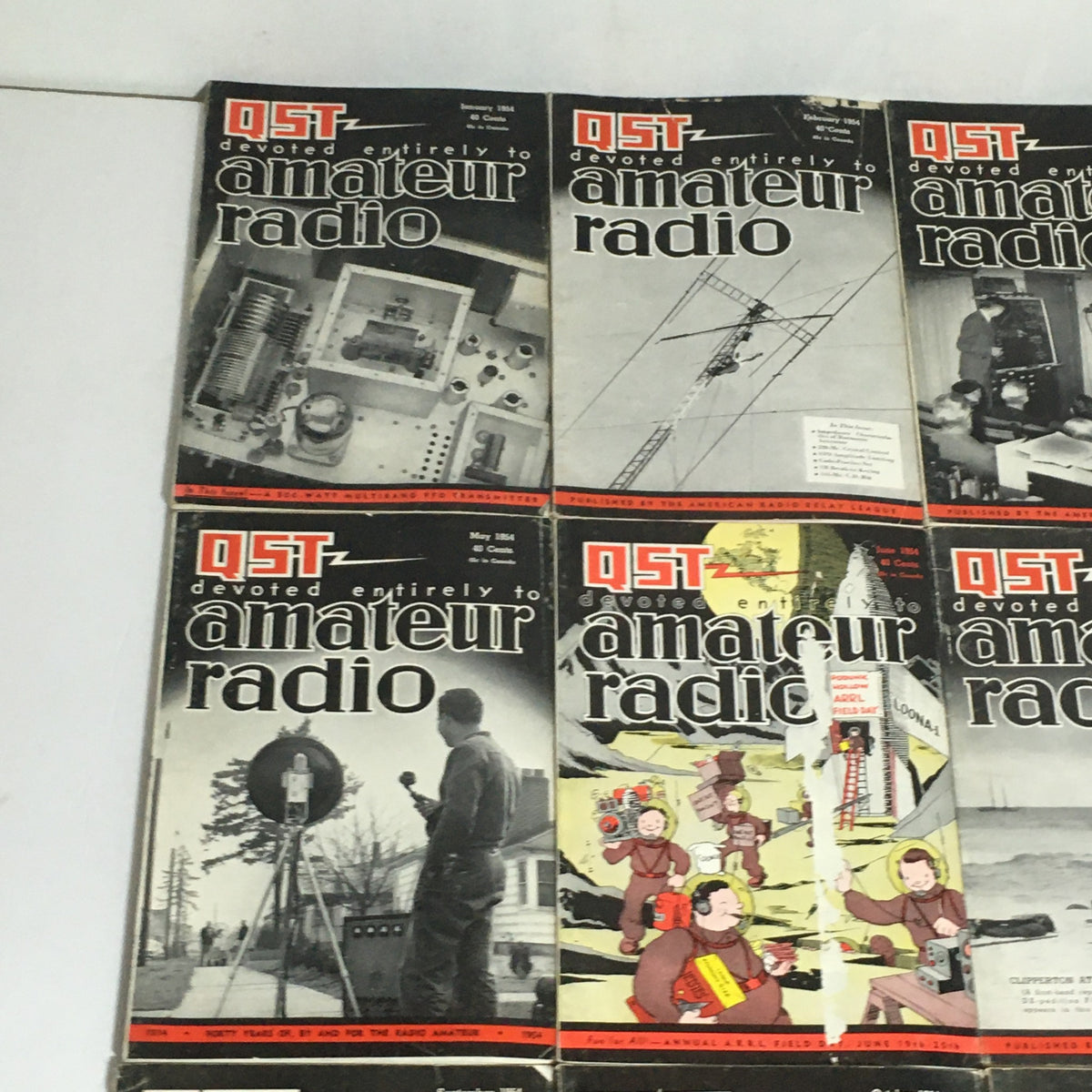 January to June 1954 covers of the QST Amateur Radio magazines, highlighting vintage amateur radio equipment and enthusiasts.