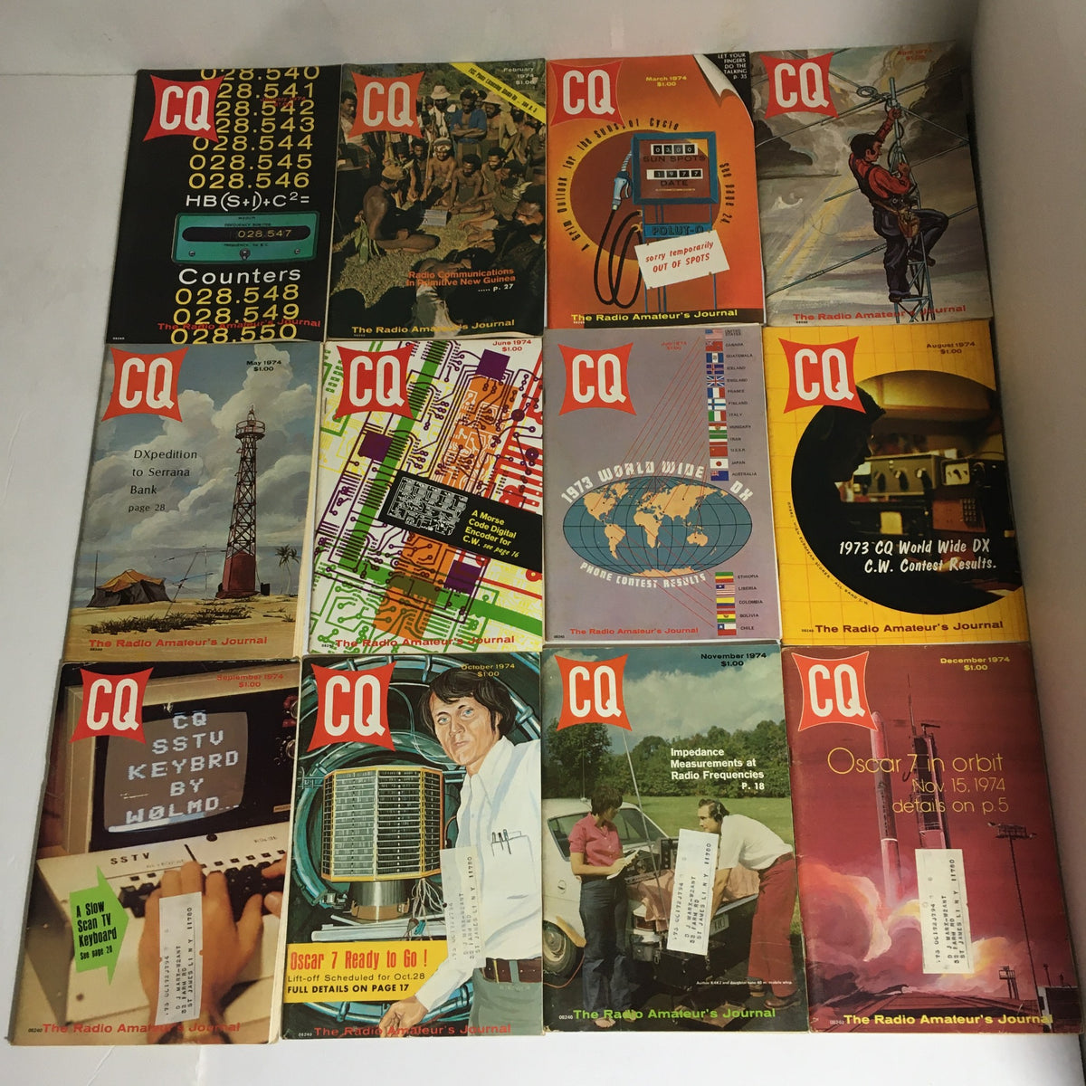 Lot of 12 Complete January to December 1974 CQ The Radio Amateur's Journal covers displayed, showcasing various editions with illustrations related to amateur radio, including articles and features from 1974.