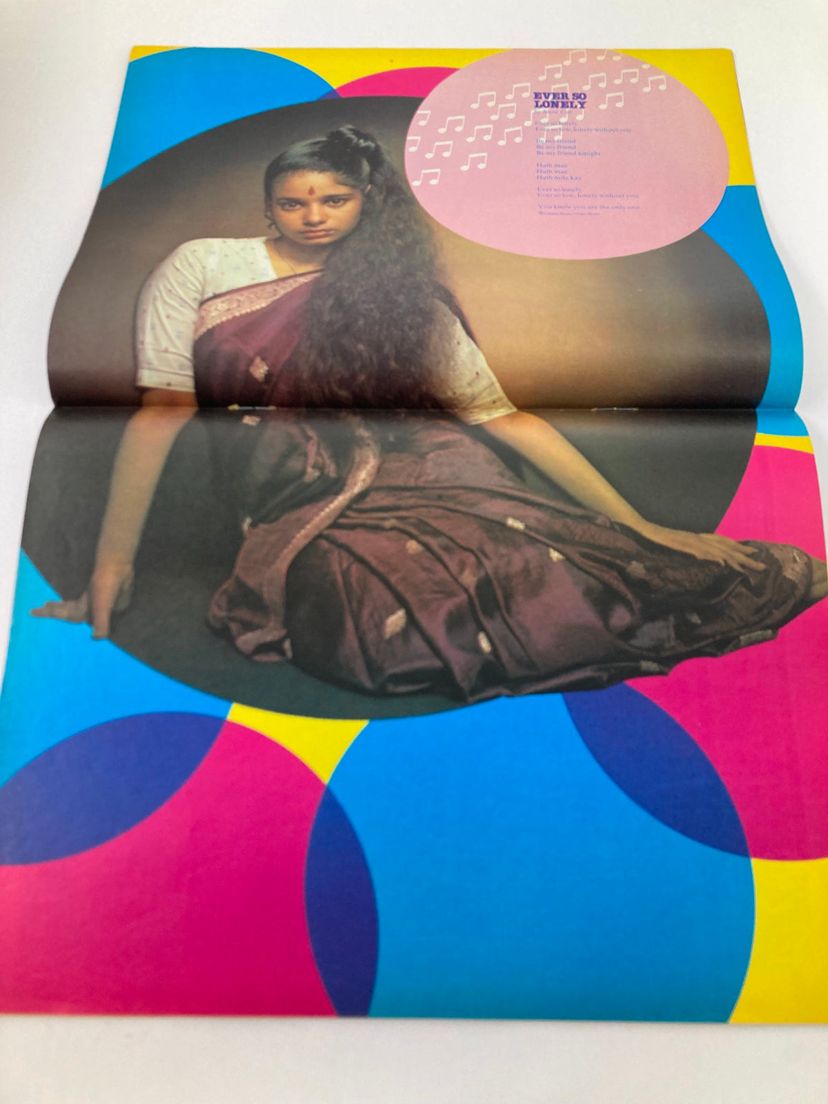 Inside spread of VTG Lookin Magazine May 29 1982 #22 featuring Sheila Chandra of Monsoon in a stylish outfit, highlighting the eclectic fashion and culture of the 1980s.