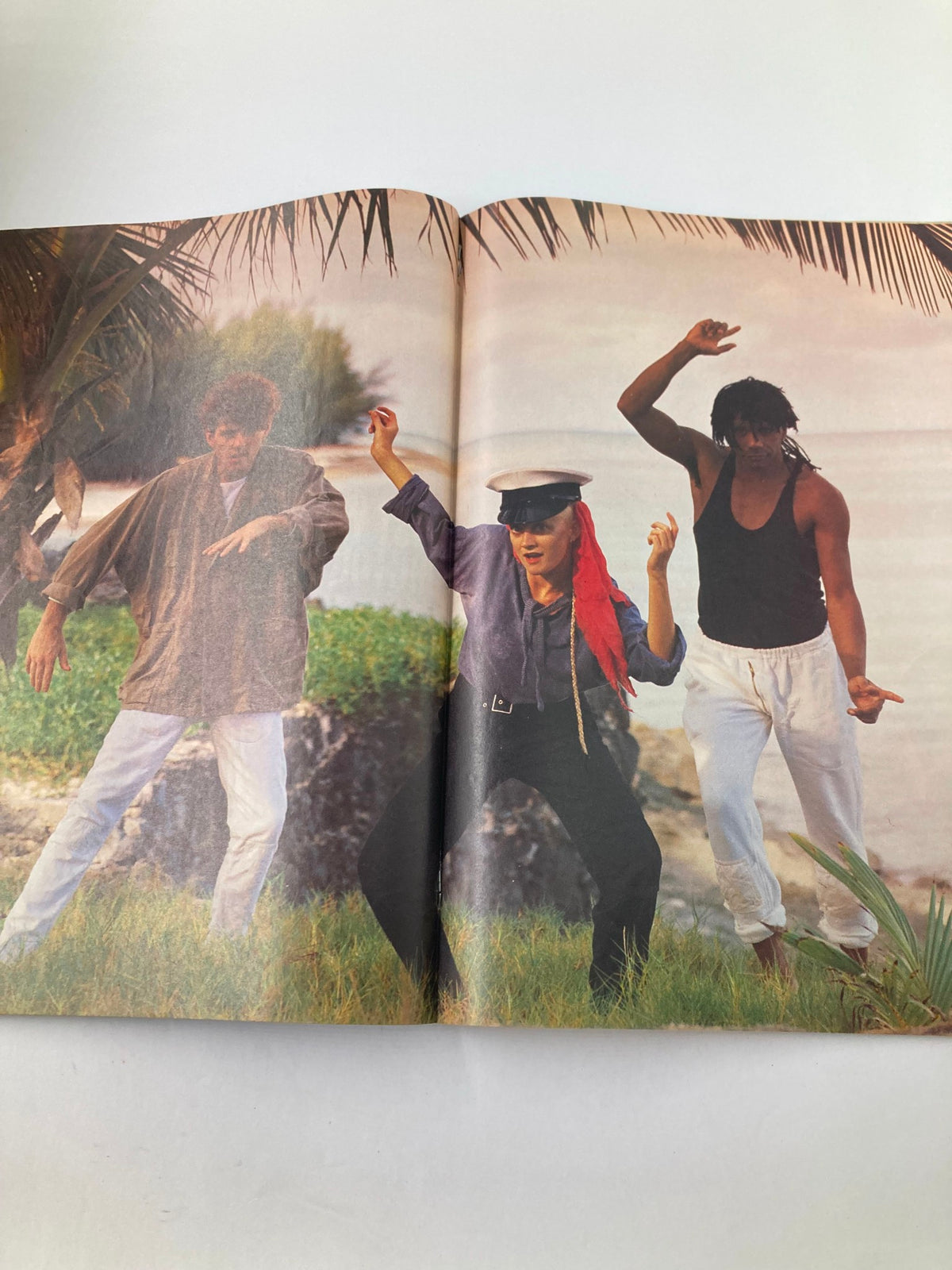 Dancers posing outdoors in the Lookin Magazine March 3, 1984, Issue #10, featuring The Thompson Twins and Icicle Works, showcasing vibrant 80s fashion and style.