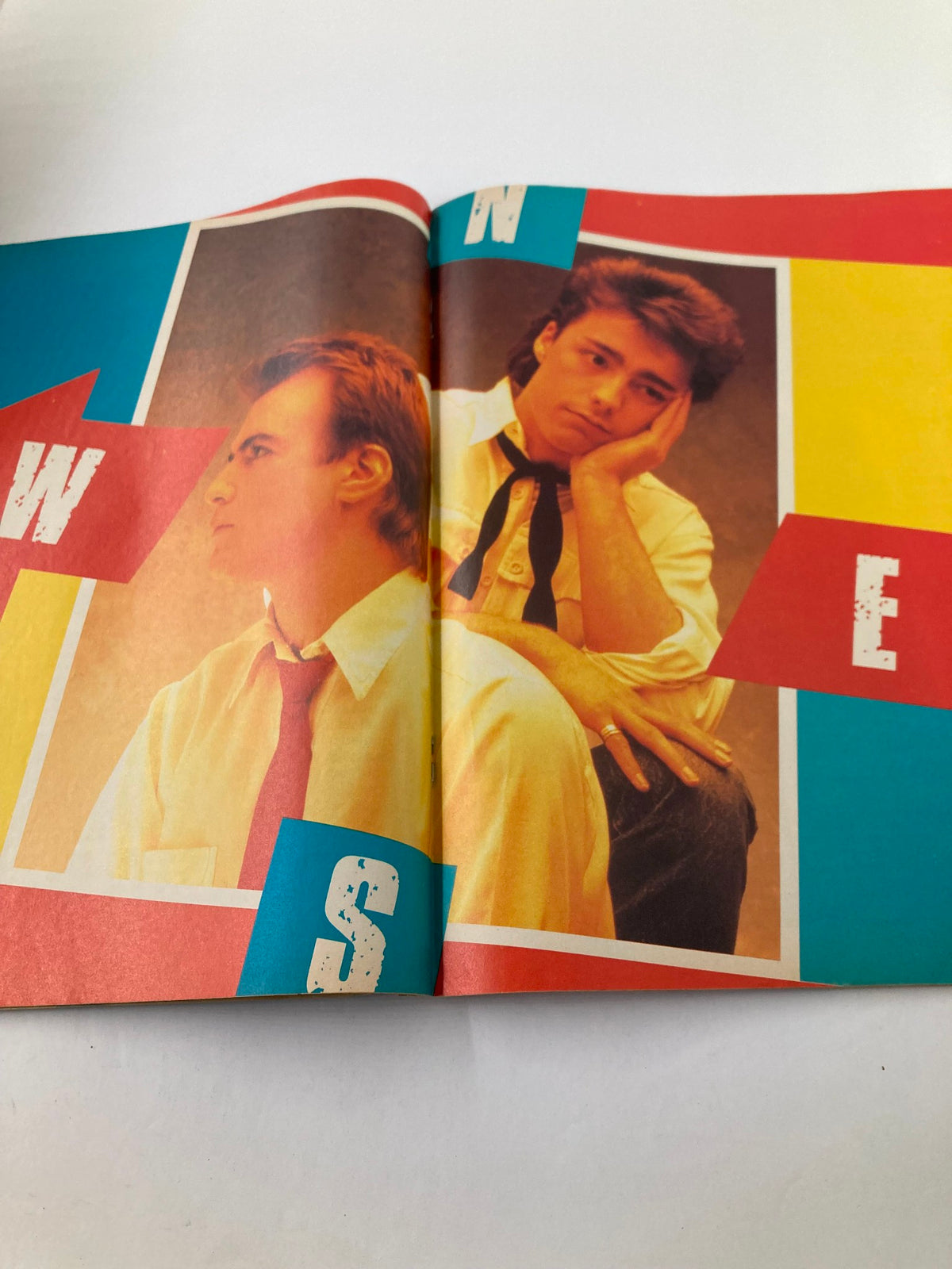 Inside spread of VTG Lookin Magazine April 27 1985 #18 featuring striking visuals of pop duo Go West, representing 1980s music culture with colorful graphics.