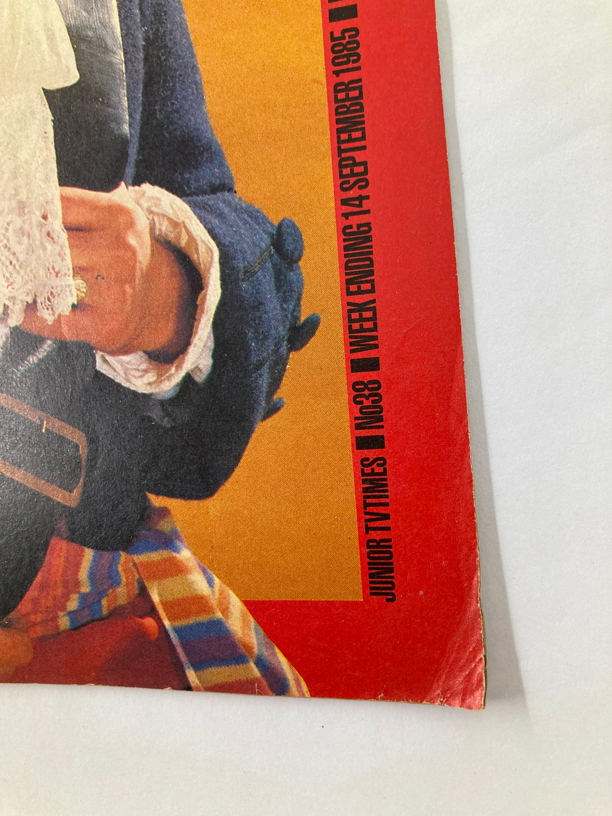 Close-up detail of the cover of VTG Lookin Magazine September 14, 1985, issue #38 showing Russ Abbot's outfit and part of the magazine title.