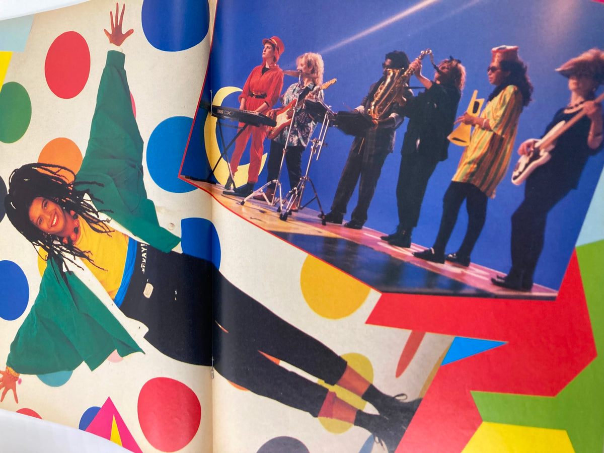 Interior pages of VTG Lookin Magazine September 14, 1985, issue #38 showcasing vibrant color patterns and musicians in 80s fashion, capturing the era's entertainment style.