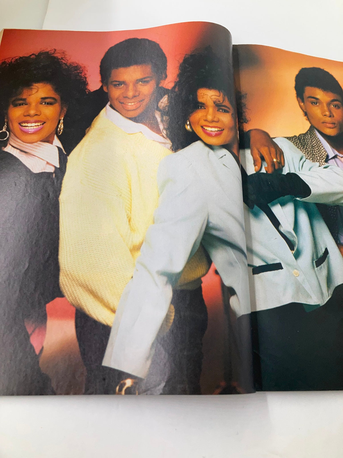 Inside spread of VTG Lookin Magazine August 9 1986 #33 featuring four artists, highlighting their unique fashion and hairstyles reflective of 1980s pop culture.