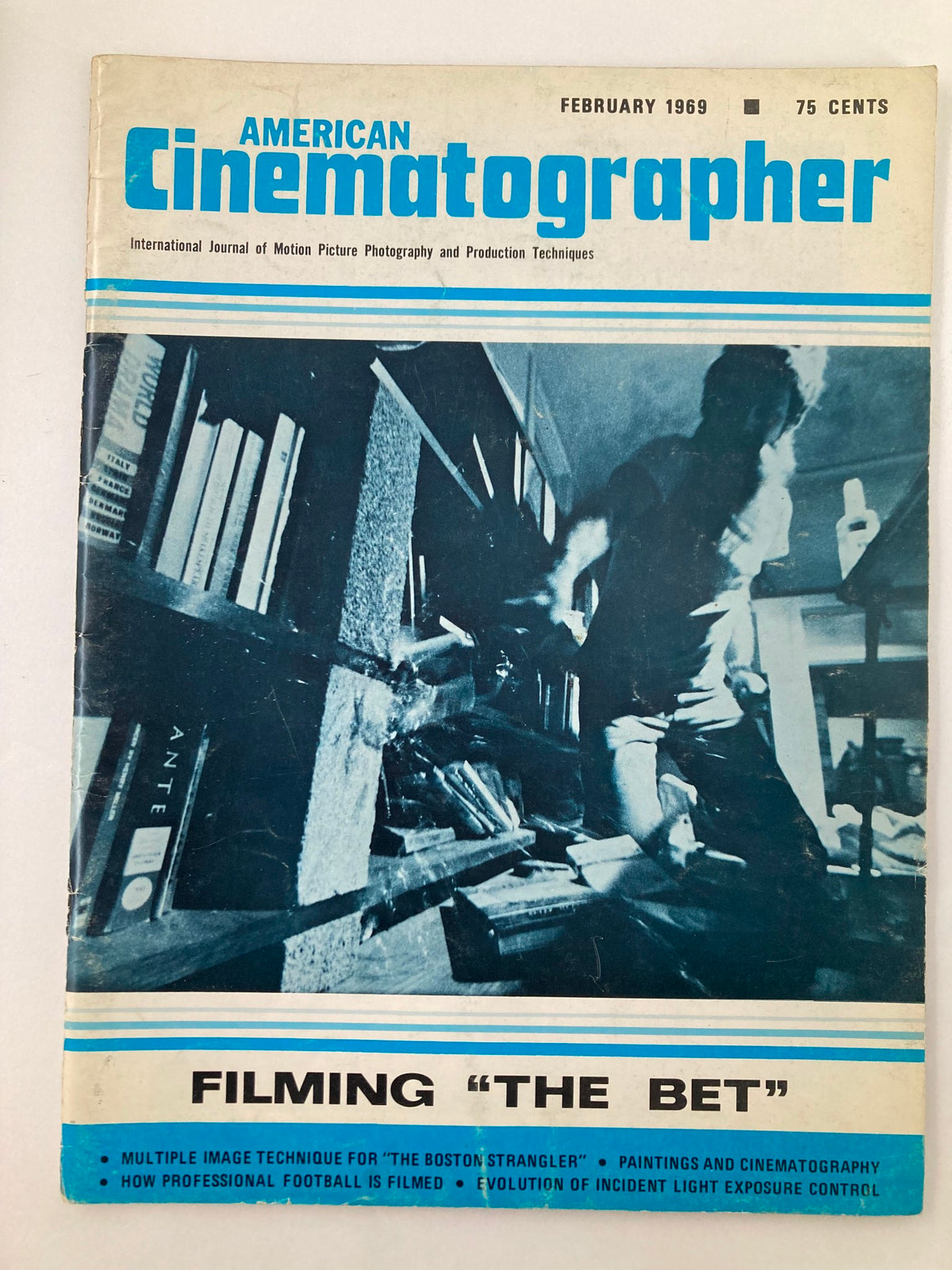 Cover of American Cinematographer Magazine February 1969 featuring the title 'Filming The Bet' with a photographer in action, showcasing vintage film techniques.