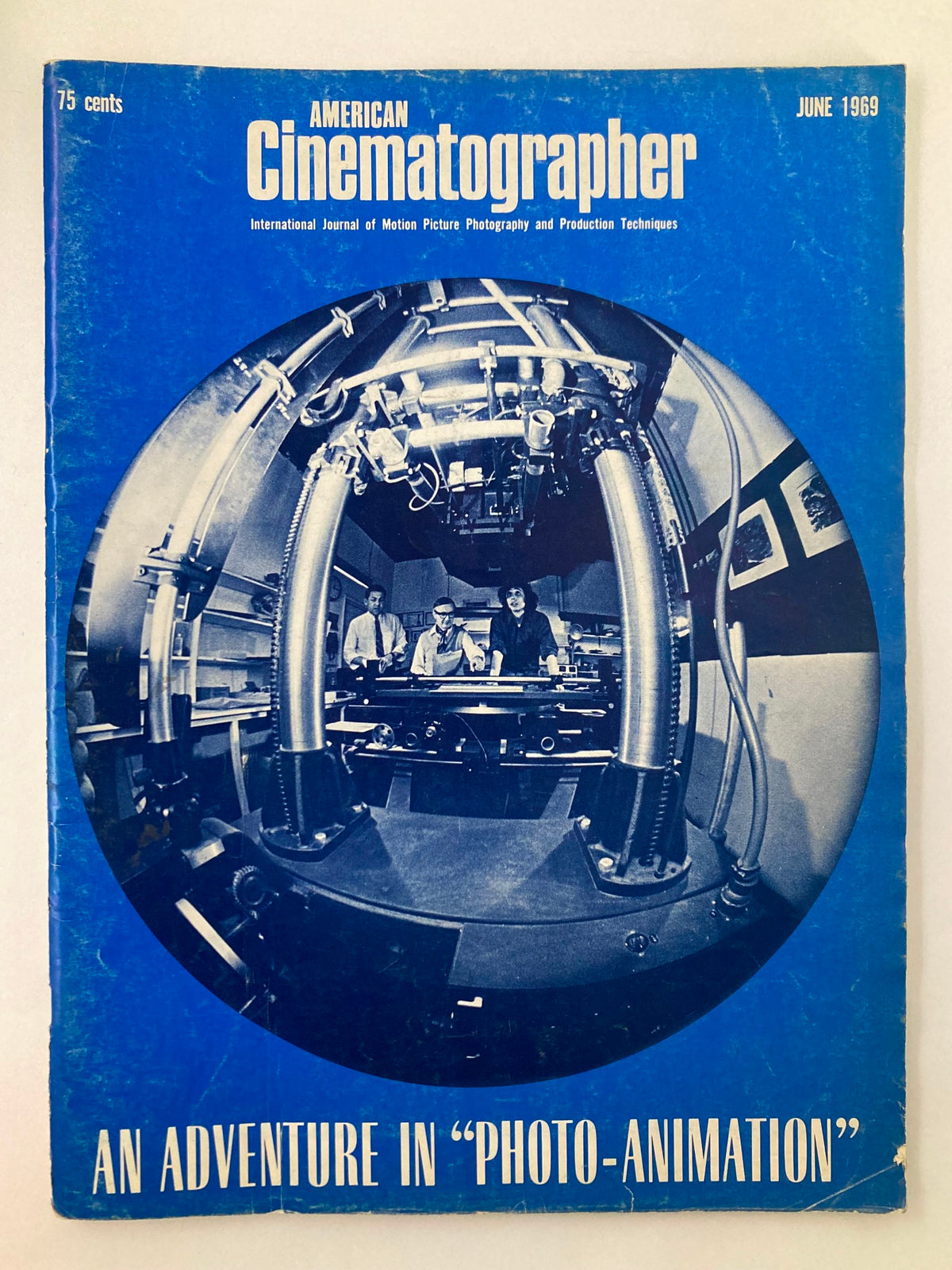 Cover of American Cinematographer Magazine June 1969 featuring an article titled 'An Adventure in Photo-Animation', showcasing a vintage design with a prominently displayed blue background and a photograph of filmmaking equipment and crew.