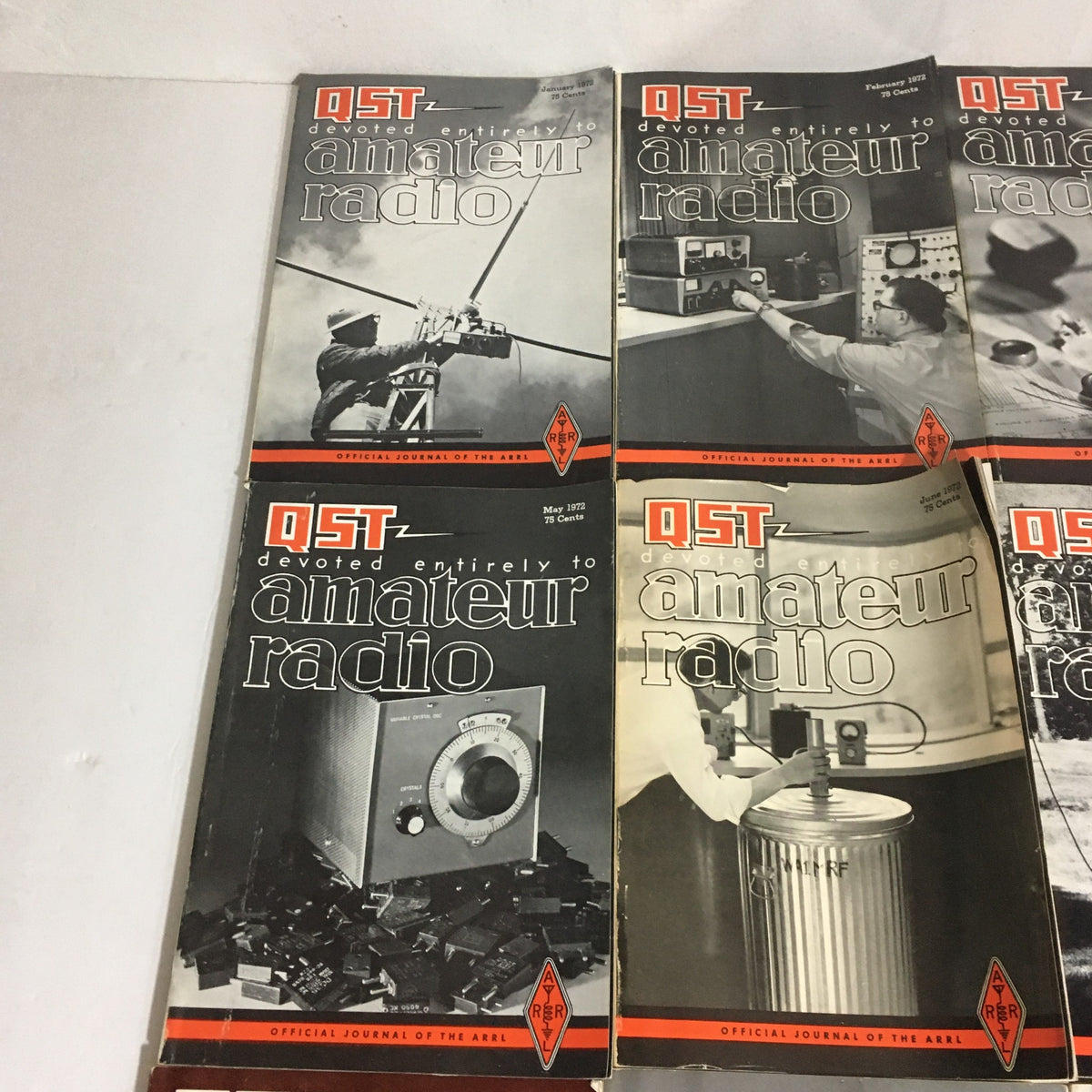 Lot of 12 Complete January to December 1972 QST Amateur Radio - Close-up of magazine covers featuring various amateur radio equipment and activities from the 1972 issues.