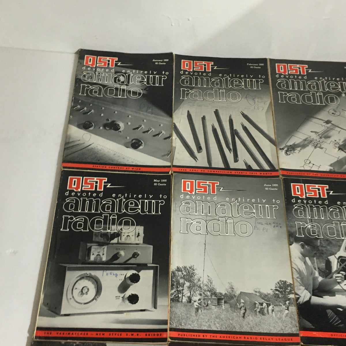 Lot of 12 Complete January to December 1966 QST Amateur Radio Volumes featuring various covers and vintage designs from the year.