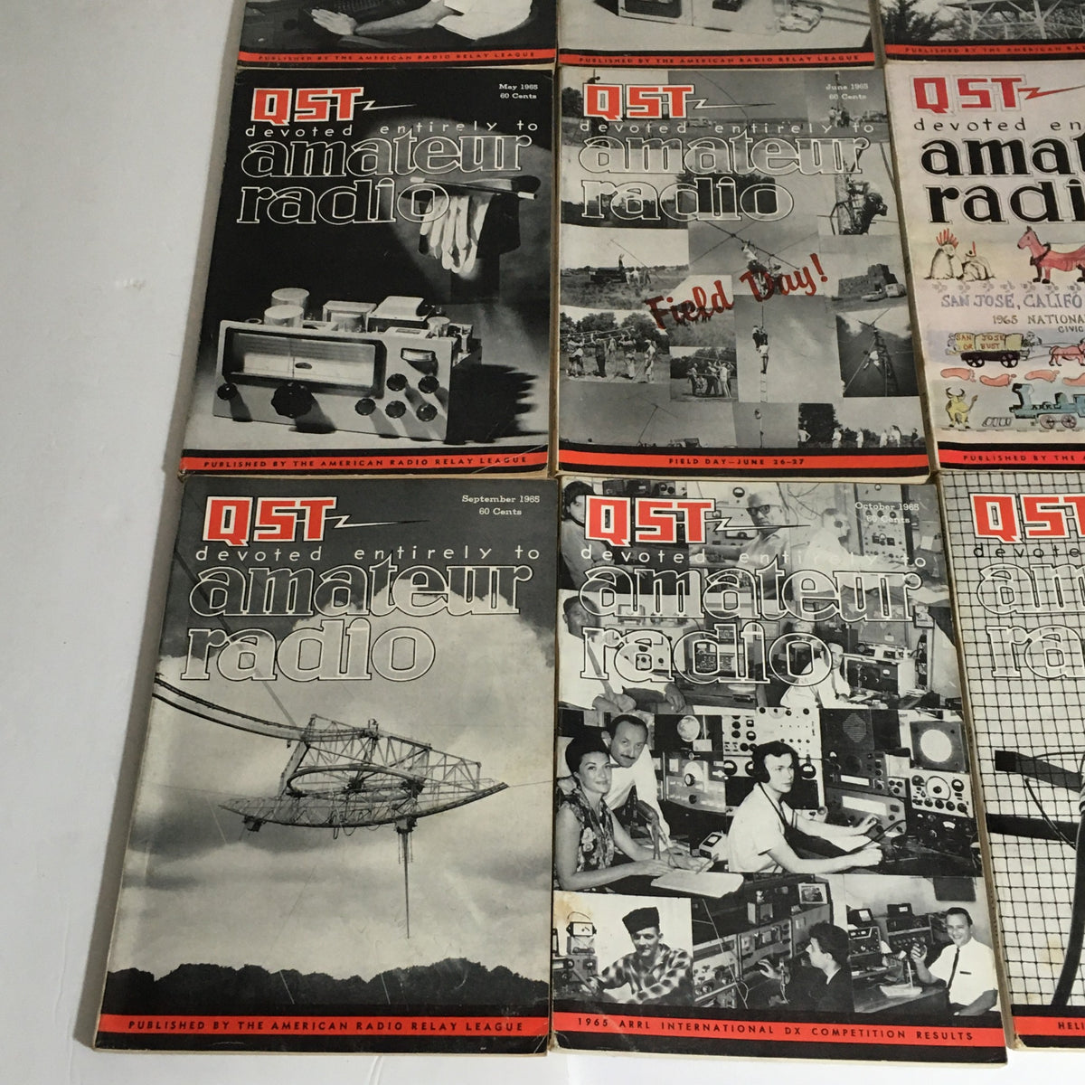 Lot of 12 Complete January to December 1965 QST Amateur Radio magazines featuring colorful covers and informative content about the amateur radio community.