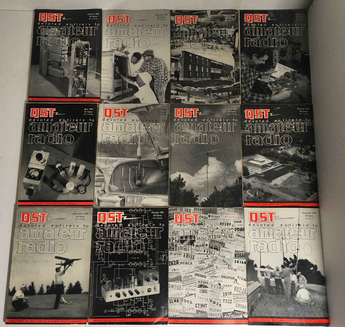 Lot of 12 Complete January to December 1963 QST Amateur Radio magazines featuring vintage covers showcasing amateur radio technology and activities from that year.