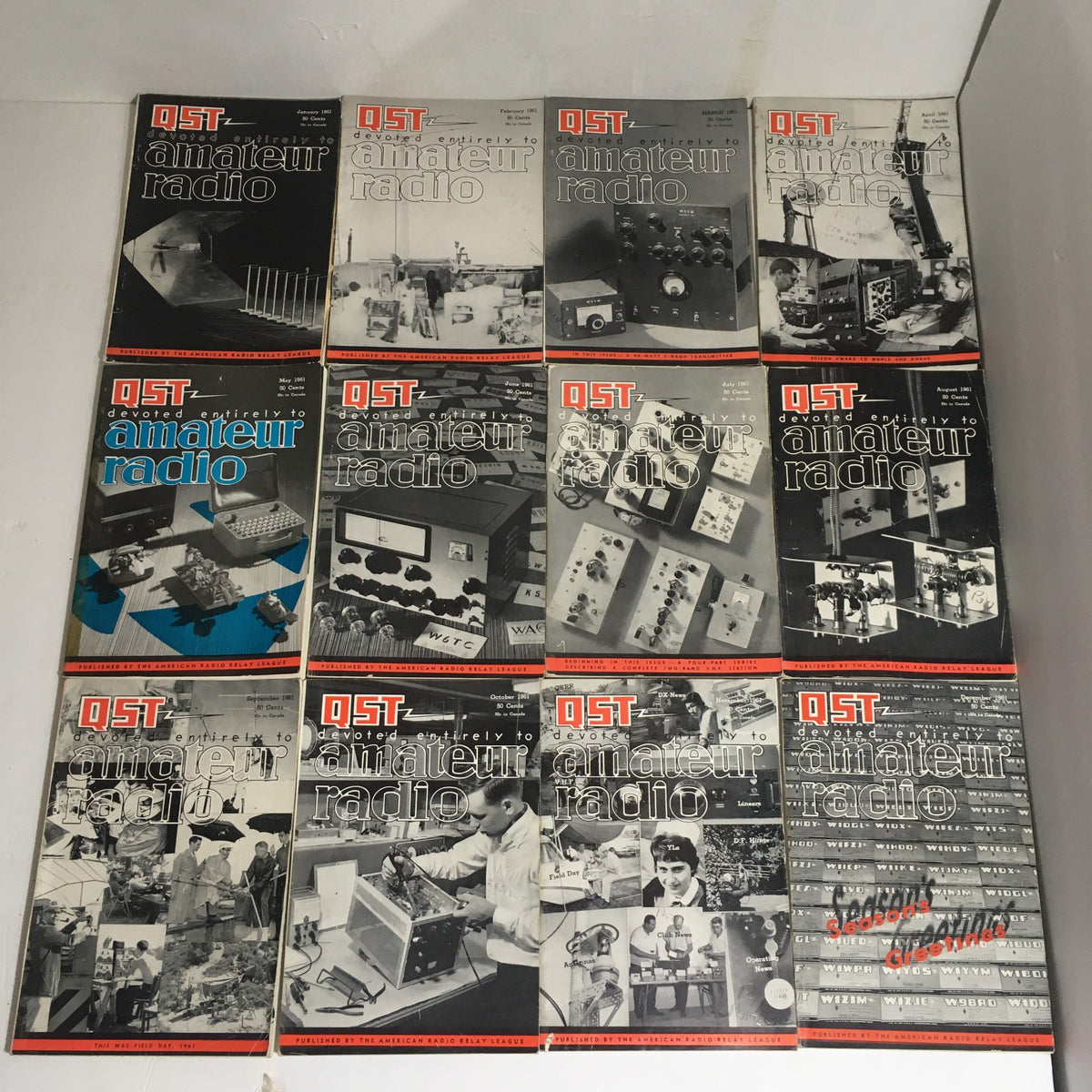 Lot of 12 Complete January to December 1961 QST Amateur Radio magazines displayed in rows, showcasing each cover featuring various amateur radio equipment and articles.