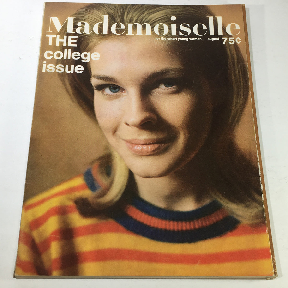 Cover of VTG Mademoiselle Magazine: August 1964 - Retro The College Issue featuring a stylish woman with blonde hair wearing a striped sweater, emphasizing vintage fashion and culture from the 1960s.