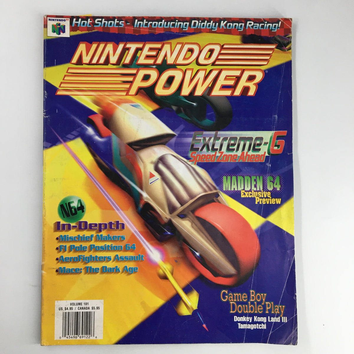 Cover of Nintendo Power Magazine #101 from October 1997 featuring the headline 'Extreme-6 Speed Zone Ahead' with a colorful illustration showcasing a futuristic racing vehicle. The magazine includes highlights about upcoming Nintendo 64 games and features a nostalgic look back at late '90s gaming culture.