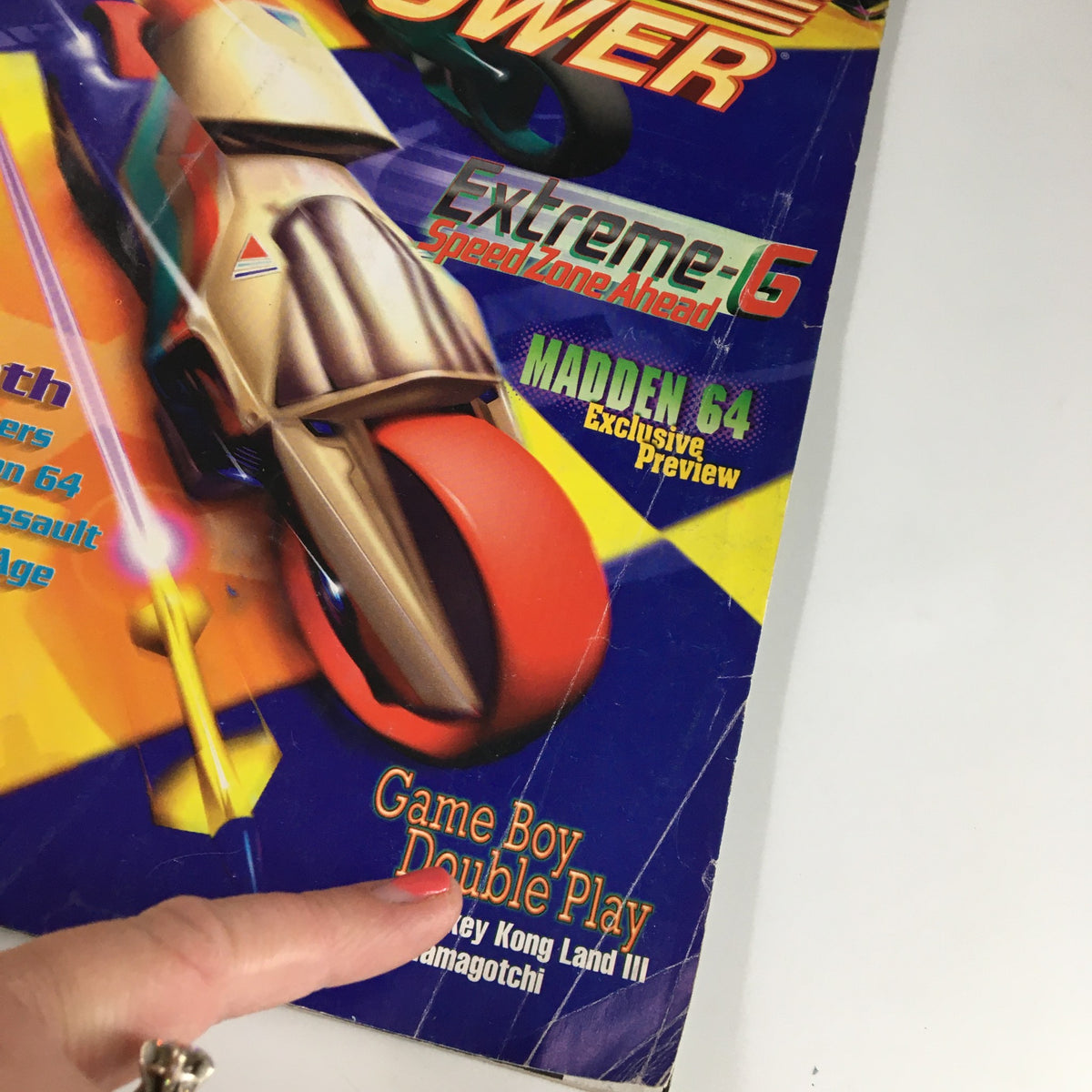 Cover of Nintendo Power Magazine #101 from October 1997 featuring the headline 'Extreme-6 Speed Zone Ahead' along with a vibrant graphic of a futuristic vehicle. Perfect for vintage gaming enthusiasts.