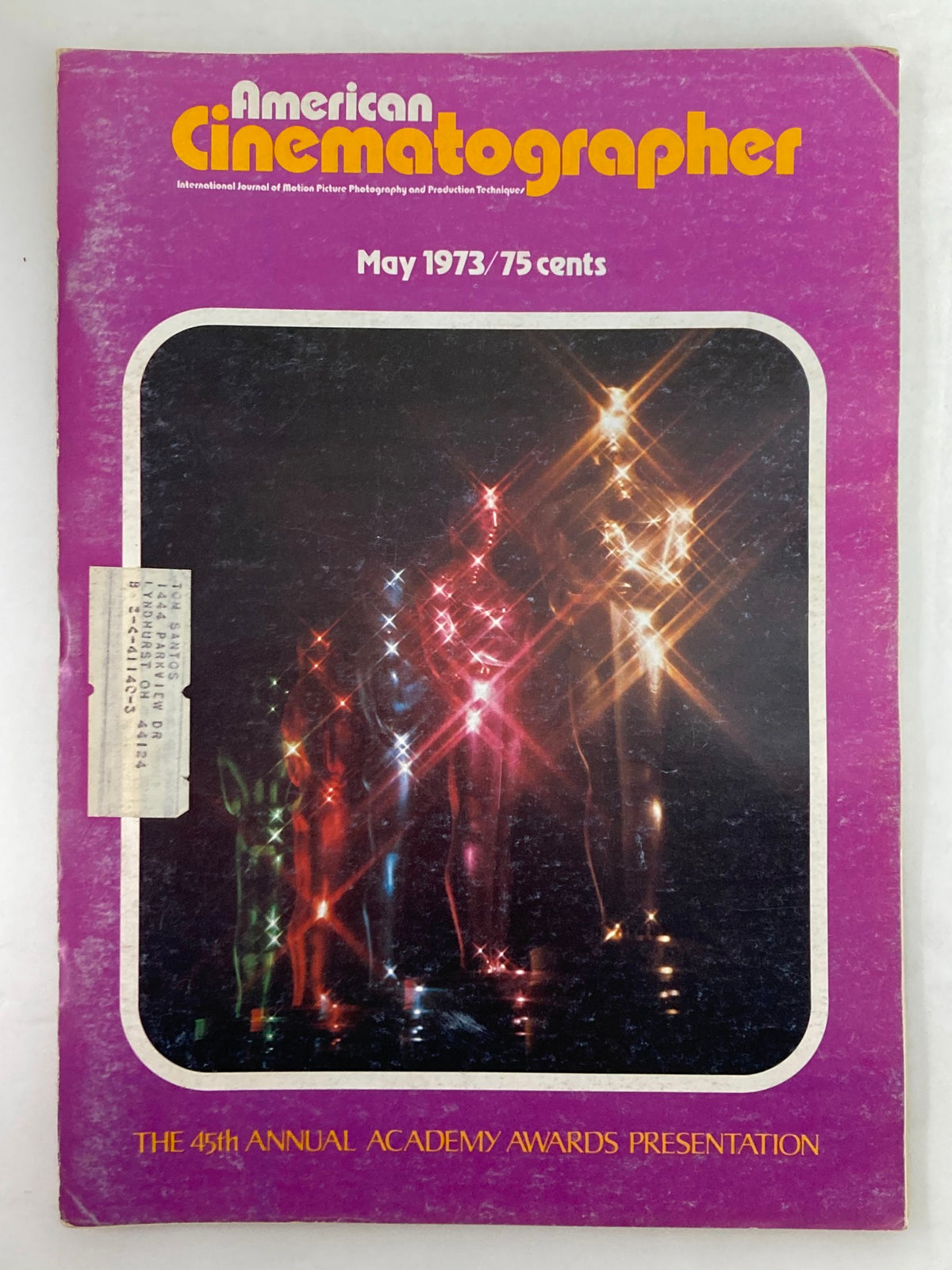 Cover of American Cinematographer Magazine May 1973 featuring the 45th Annual Academy Awards presentation with vibrant colors and images representing the film industry.
