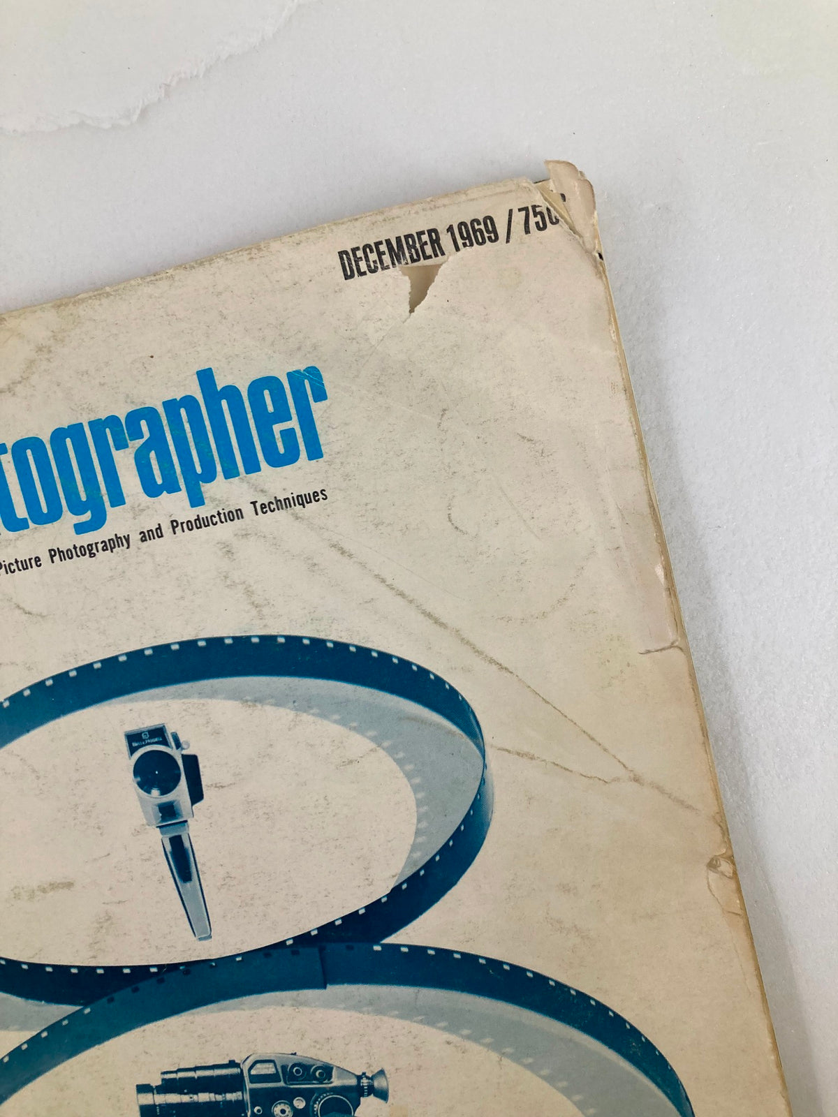 Cover of American Cinematographer Magazine December 1969 showing the title, issue date, and part of a film reel.