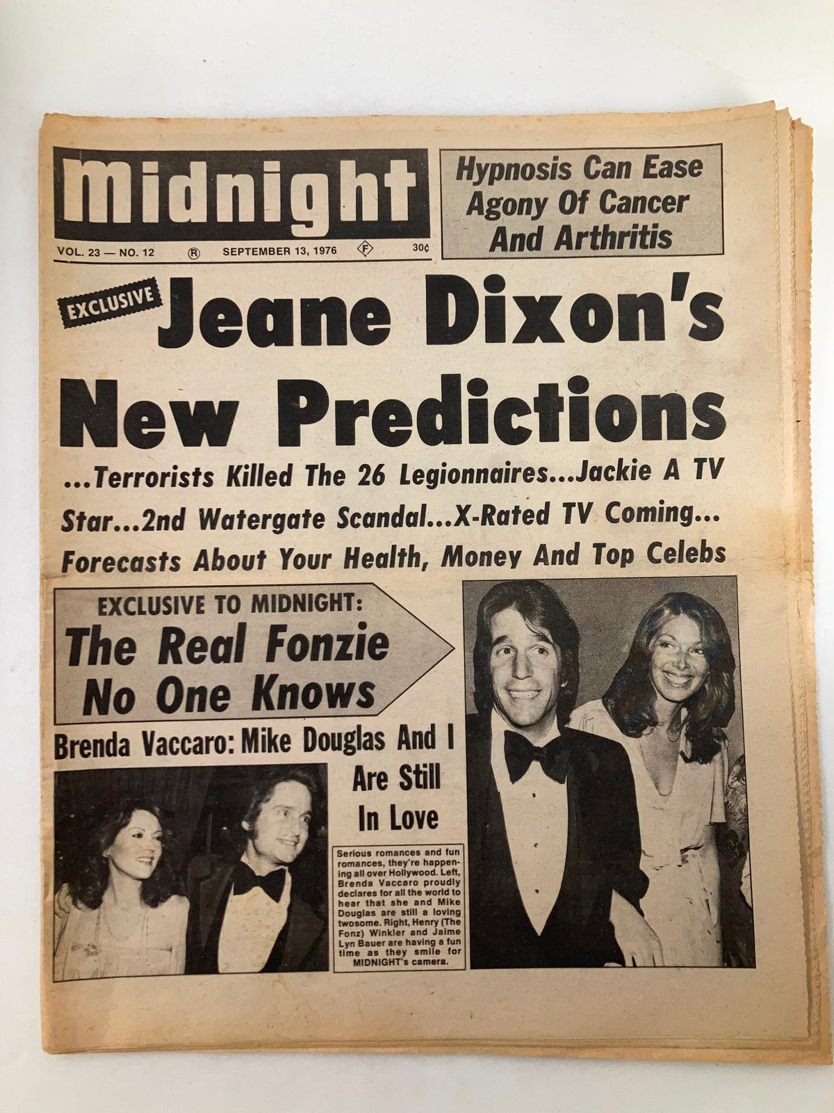 Cover of Midnight Tabloid September 13, 1976, Vol 23 #12 featuring Jeane Dixon's New Predictions, with headlines about terrorism, celebrities, and health topics.