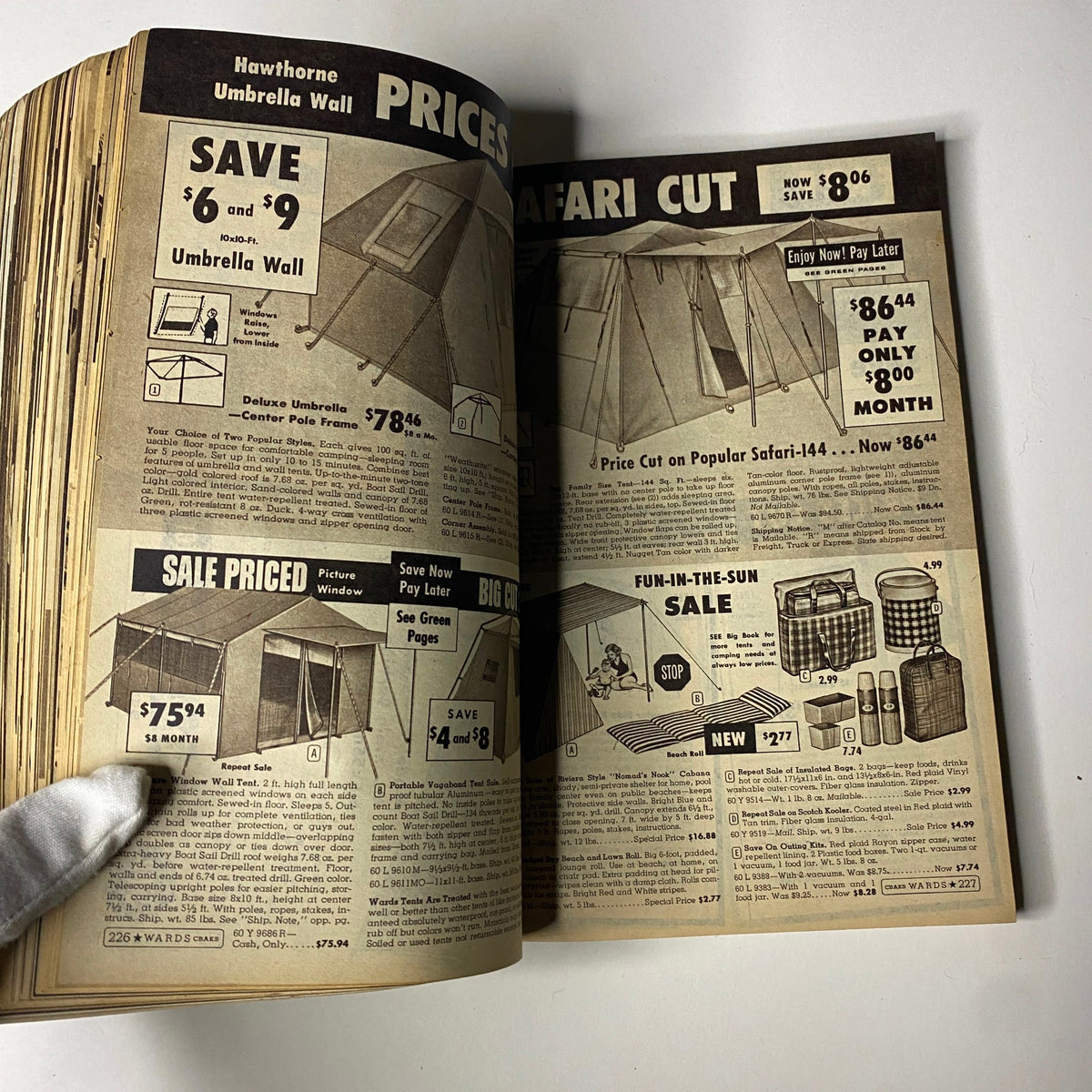 Camping equipment page from the 1959 Wards Summer Catalog displaying holiday tents and outdoor gear. Highlights includes pricing details for various camping products.