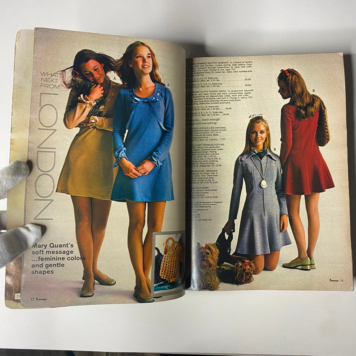 Inside spread of the 1970 JC Penneys Fall and Winter Store Catalog featuring fashionable women's dresses inspired by London styles, with accessories and a casual pose.