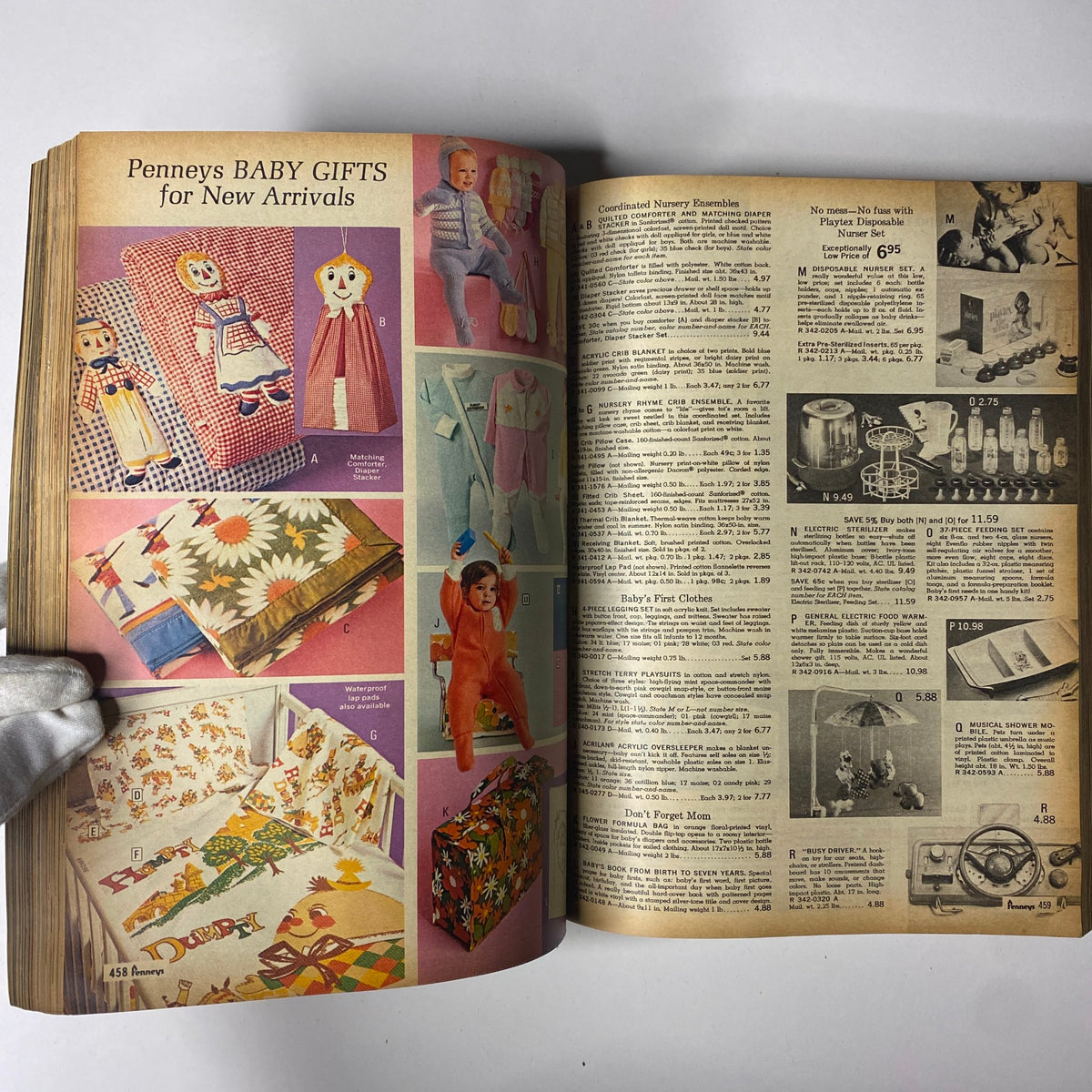1970 JC Penneys Fall and Winter Store Catalog featuring baby gifts and nursery items, showcasing colorful toys and essential products for infants.