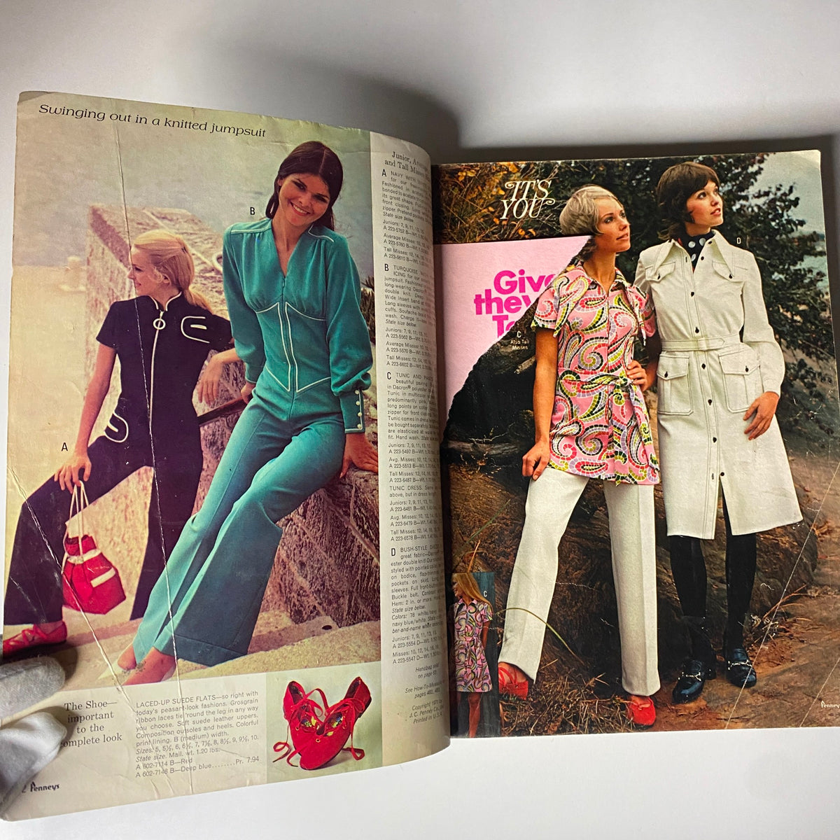 Inside spread of the 1971 JC Penneys Spring and Summer Store Catalog highlighting two models in colorful outfits including a knitted jumpsuit, demonstrating 1970s fashion aesthetics.