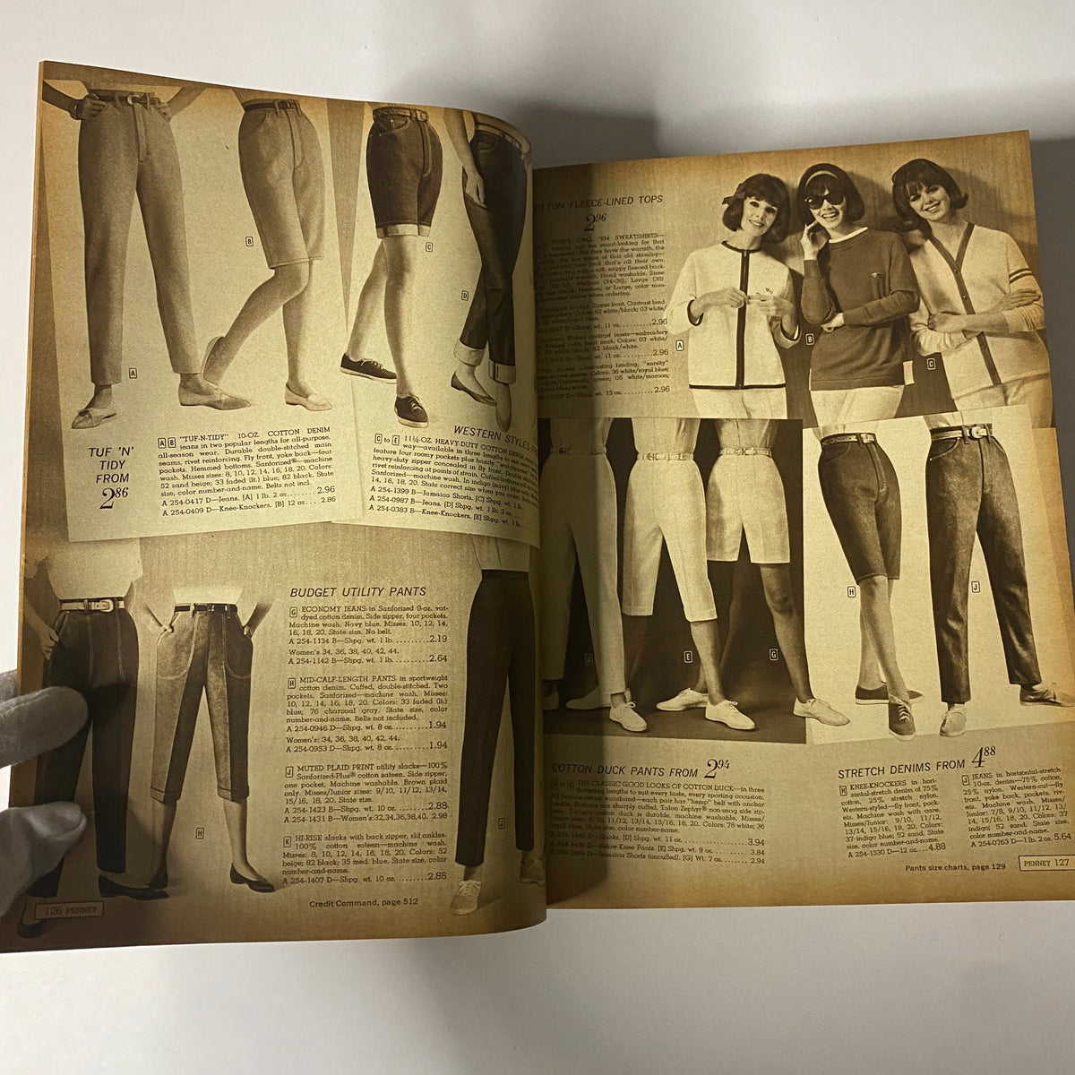1964 JC Penneys Spring and Summer Store Catalog featuring a range of women's pants, utility wear, and stylish tops, showcasing contemporary trends.