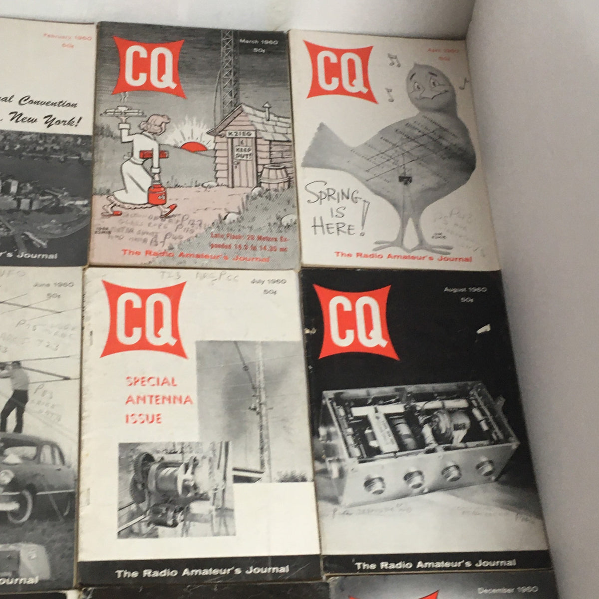 Collection of CQ The Radio Amateur's Journal magazines from 1960, including covers from January to August showing illustrations and relevant amateur radio themes.