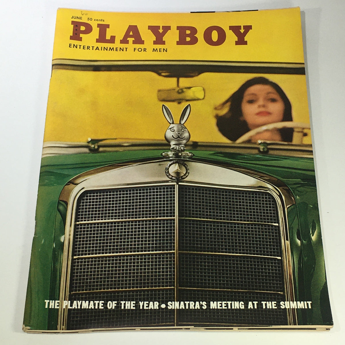 Cover of VTG Playboy Magazine: June 1960 featuring Delores Marie Wells as Playmate of the Year, showcasing the iconic Playboy logo and a vintage automobile.