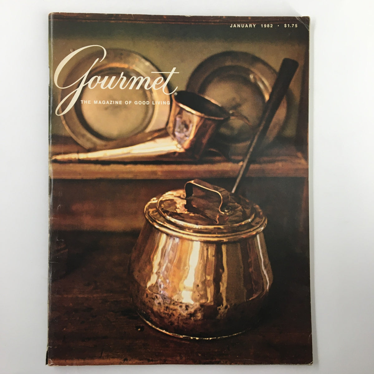 Cover of VTG Gourmet Magazine January 1982 featuring magnificent copper ware items, showcasing a copper pot and vintage kitchenware.