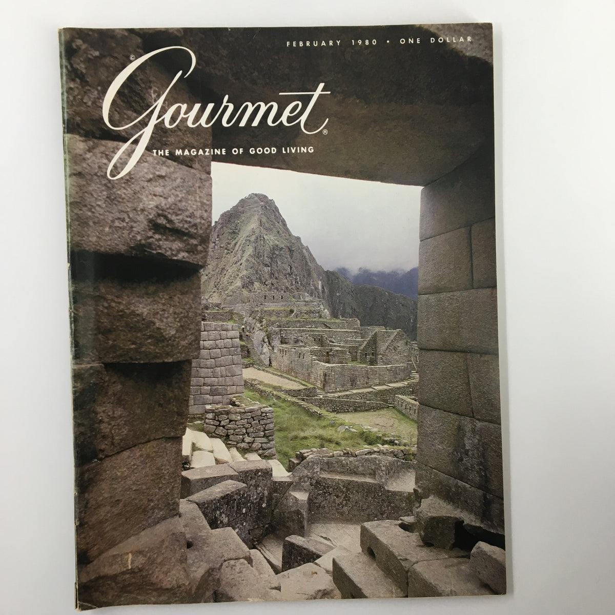 Cover of VTG Gourmet Magazine February 1980 featuring Machu Picchu, the Lost City of the Incas. The image showcases a breathtaking view of the ancient ruins, highlighting the iconic architecture against a lush mountainous backdrop.