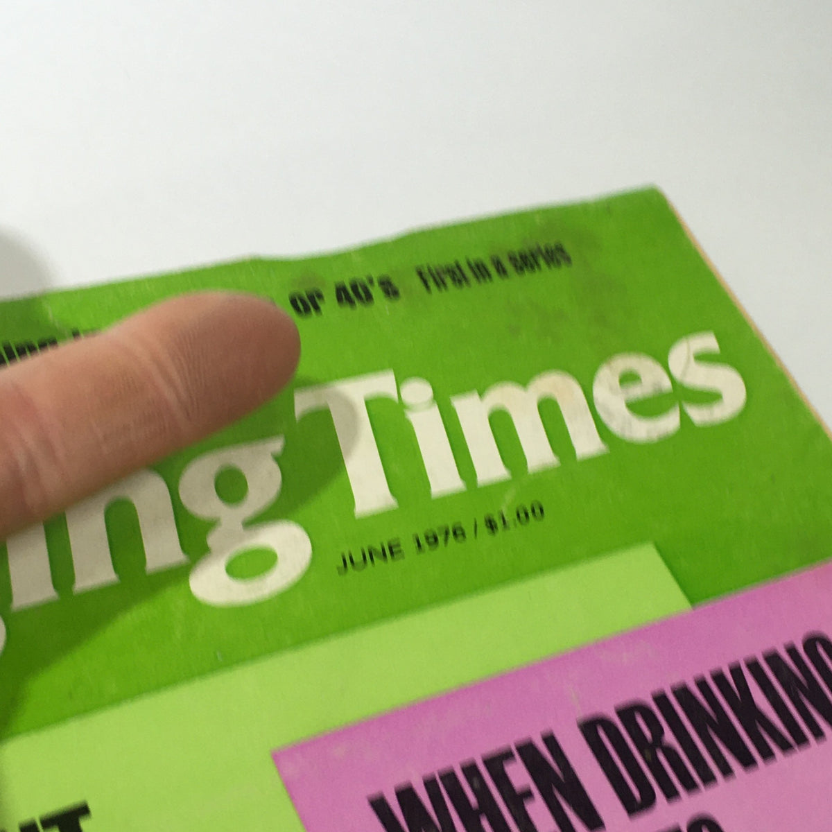 Close-up of the June 1976 issue of Changing Times Magazine, showcasing the magazine title and focus on financial advice.