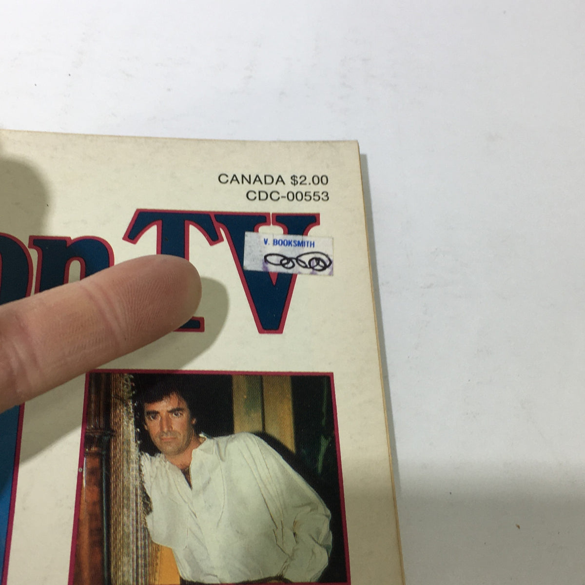 Close-up of the VTG Afternoon TV Magazine: June 1984 front cover, highlighting a price tag and the magazine's title, capturing details of vintage television memorabilia.