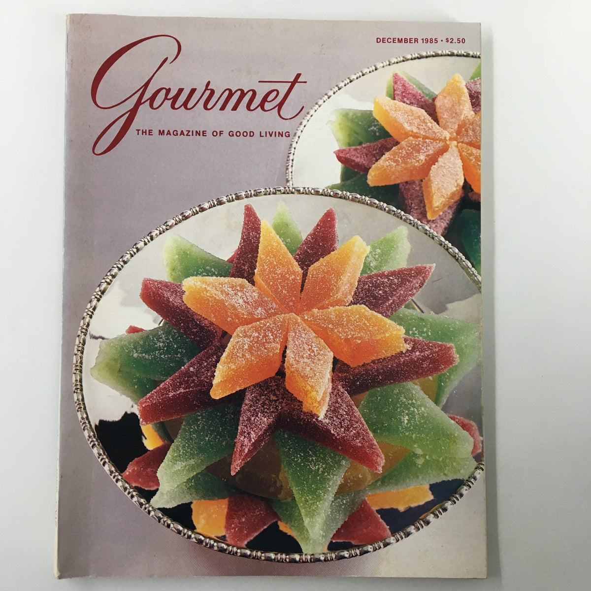 VTG Gourmet Magazine December 1985 cover featuring a vibrant arrangement of sugar-crusted pates in star shapes, showcasing culinary artistry and vintage food culture.