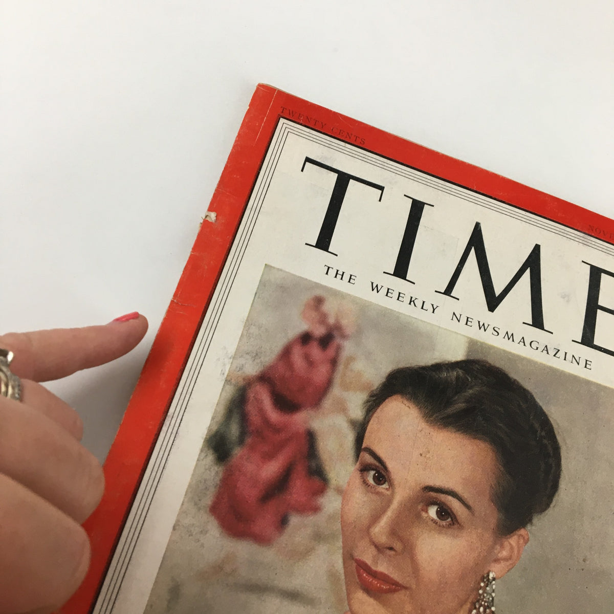 Close-up view of vintage Time Magazine from November 17, 1952, displaying Claire Bloom's cover, with emphasis on the magazine's title and wear details.