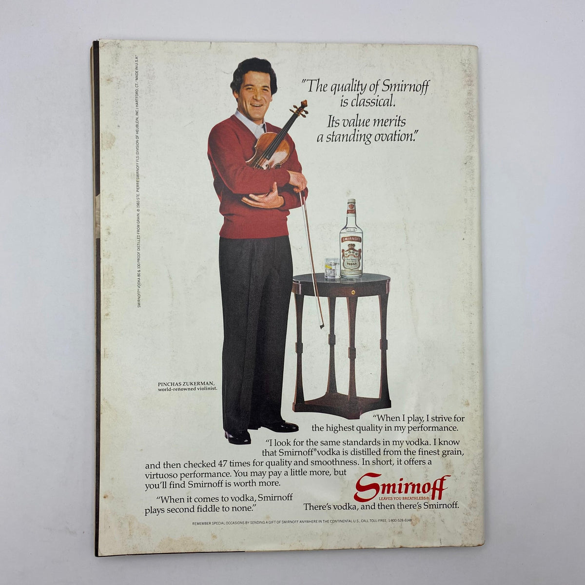 Back cover of the July 1984 Playboy Magazine, featuring an advertisement for Smirnoff Vodka with a quote about quality, alongside an image of violinist Pinchas Zukerman.