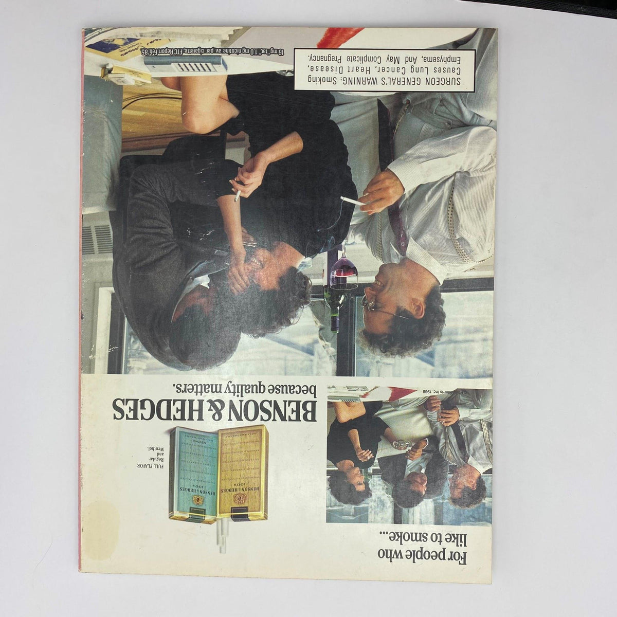 Back cover of Playboy Magazine September 1988, displaying an advertisement for Benson & Hedges with a sophisticated scene of men conversing in an upscale setting.