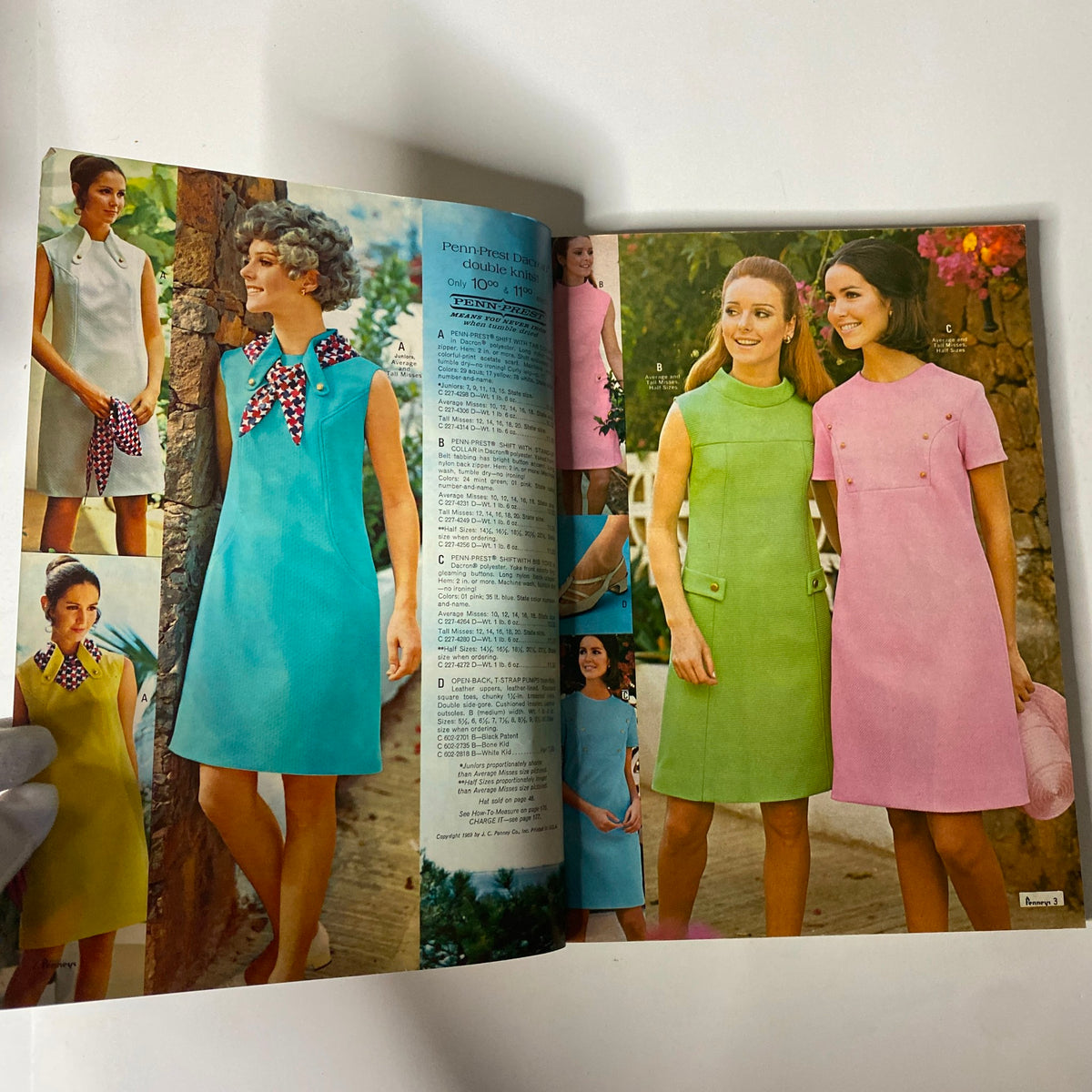 Inside spread of the 1969 JC Penneys Summer Store Catalog, showcasing models in colorful summer dresses, highlighting the fashion trends of the late 1960s.