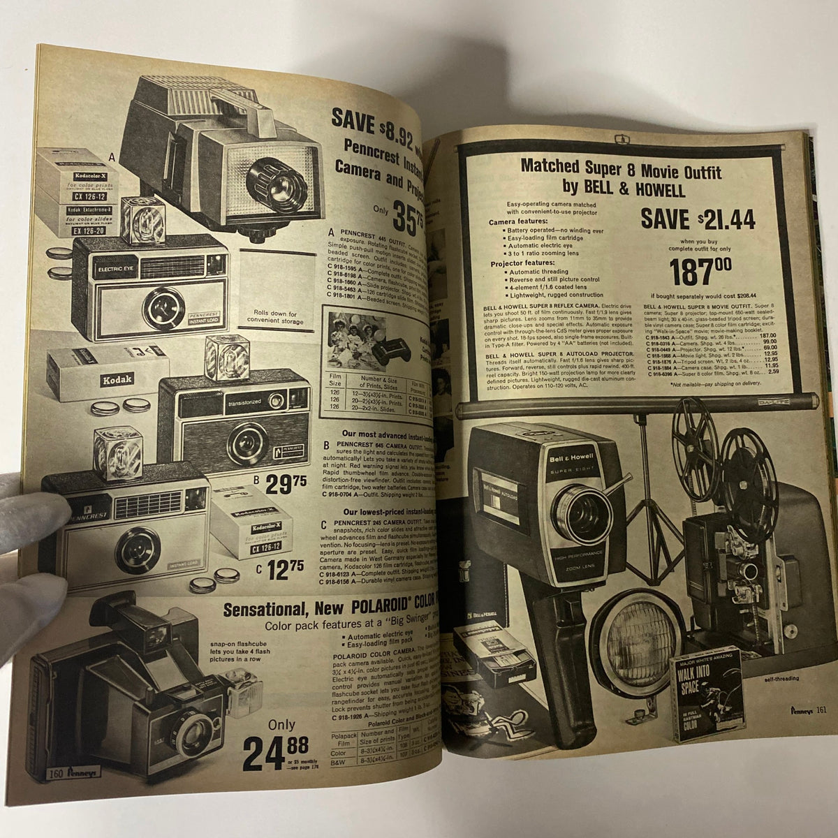 1969 JC Penneys Summer Store Catalog advertisement displaying cameras and photography equipment from brands like Polaroid and Bell & Howell, reflecting the technology of the late 60s.