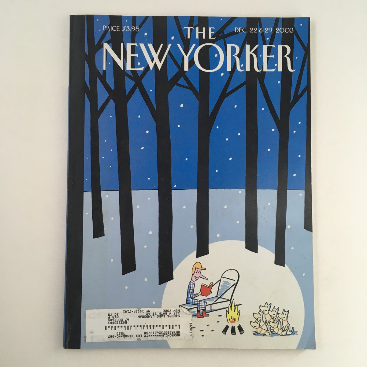 Cover of The New Yorker December 22, 2003 featuring an illustration by Philippe Petit-Roulet, depicting a figure by a campfire in a snowy landscape with tall trees.