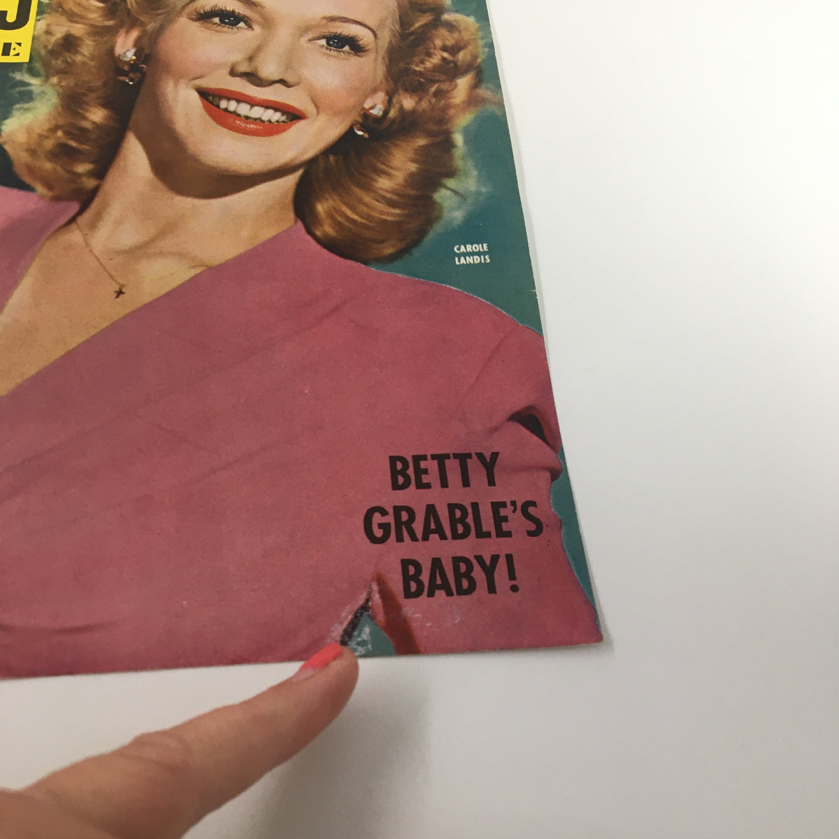 Close-up of COVER ONLY Movie Stars Parade Magazine June 1944, highlighting wear on Carole Landis cover with text about Betty Grable.
