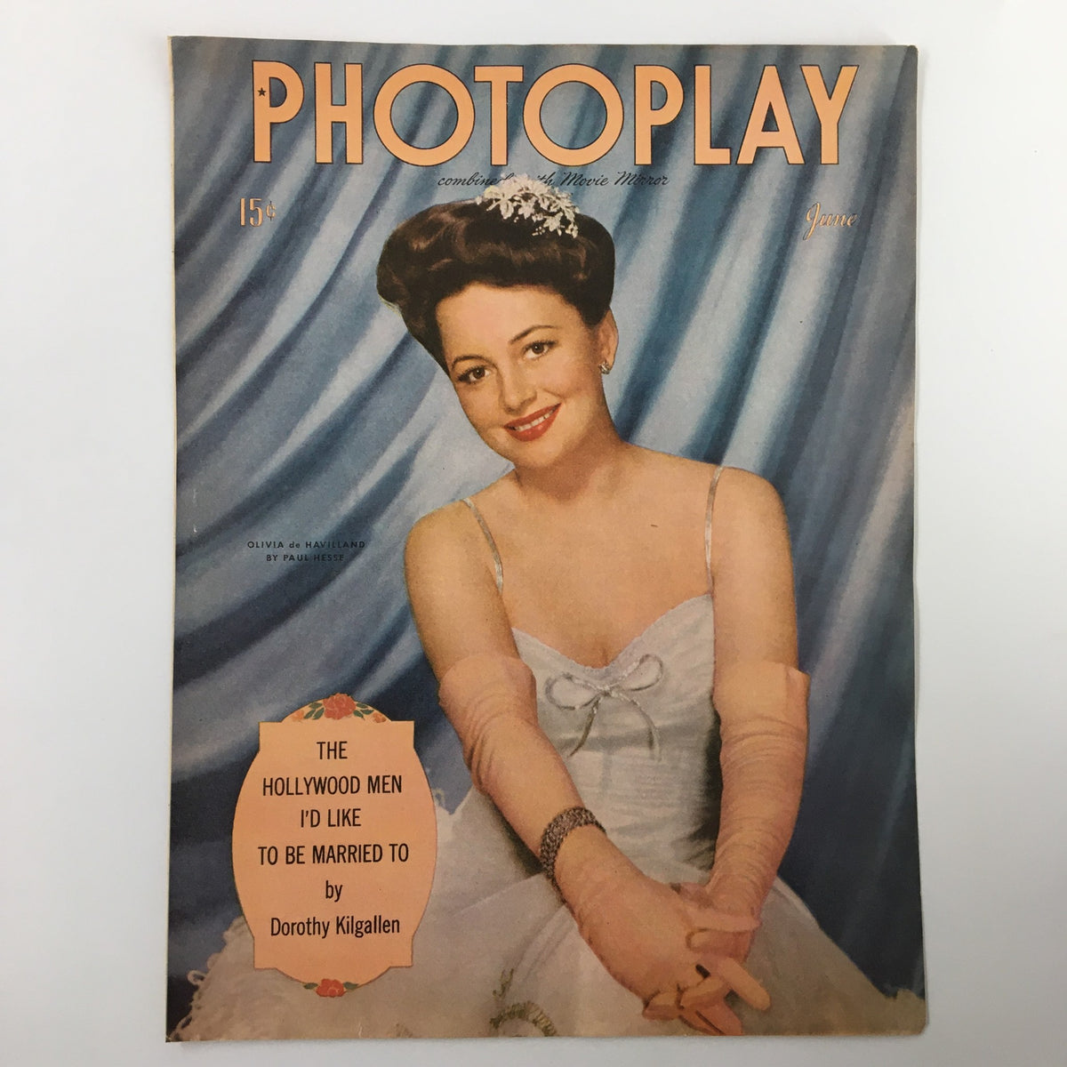 COVER ONLY Photoplay Magazine June 1944 depicting Olivia de Havilland smiling gracefully in a white gown with pink gloves, against a draped blue background.