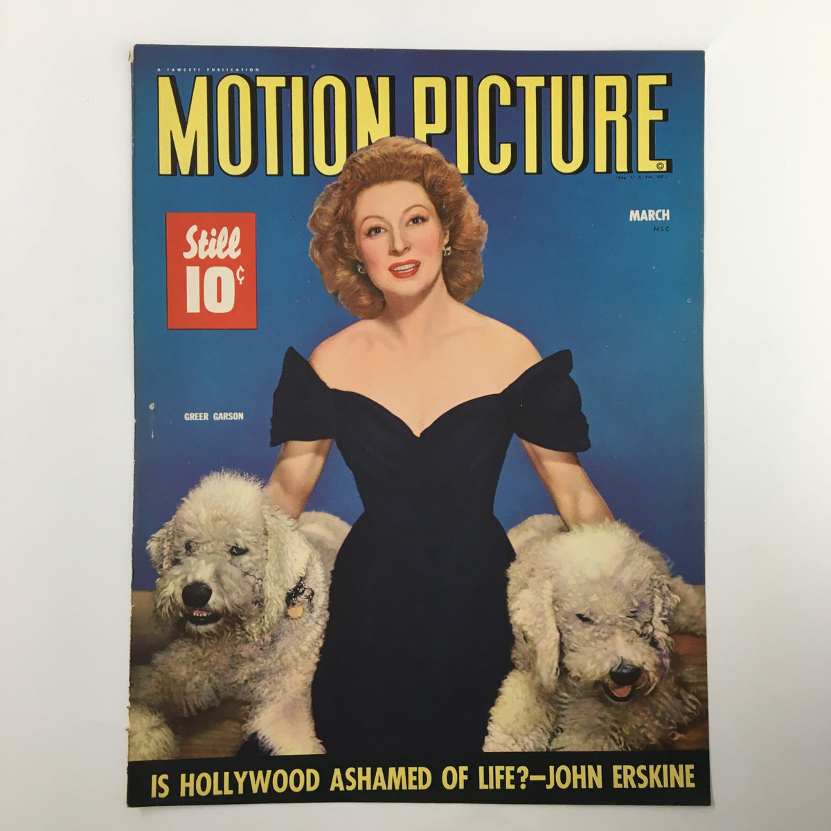COVER ONLY Motion Picture Magazine March 1943, displaying Greer Garson in a glamorous black dress and two fluffy dogs, a classic collector's item.