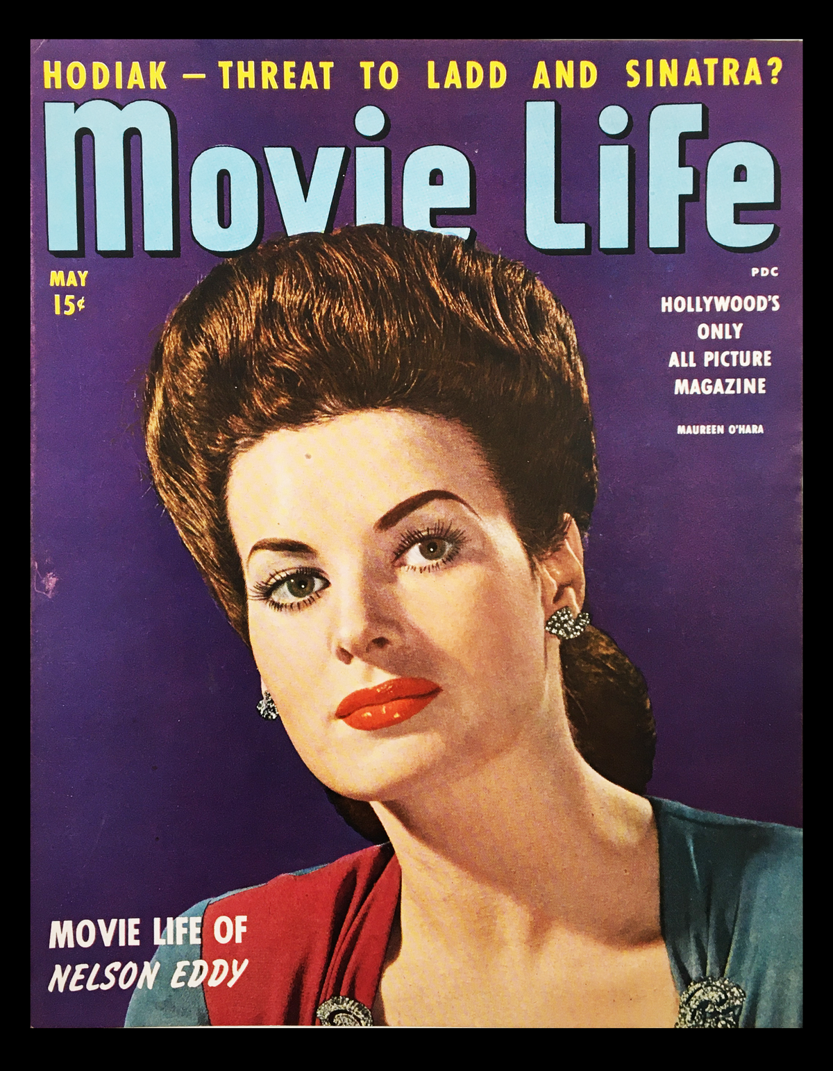 COVER ONLY Movie Life Magazine May 1944 featuring Maureen O'Hara, showcasing vintage film history with a striking portrait and colorful design.